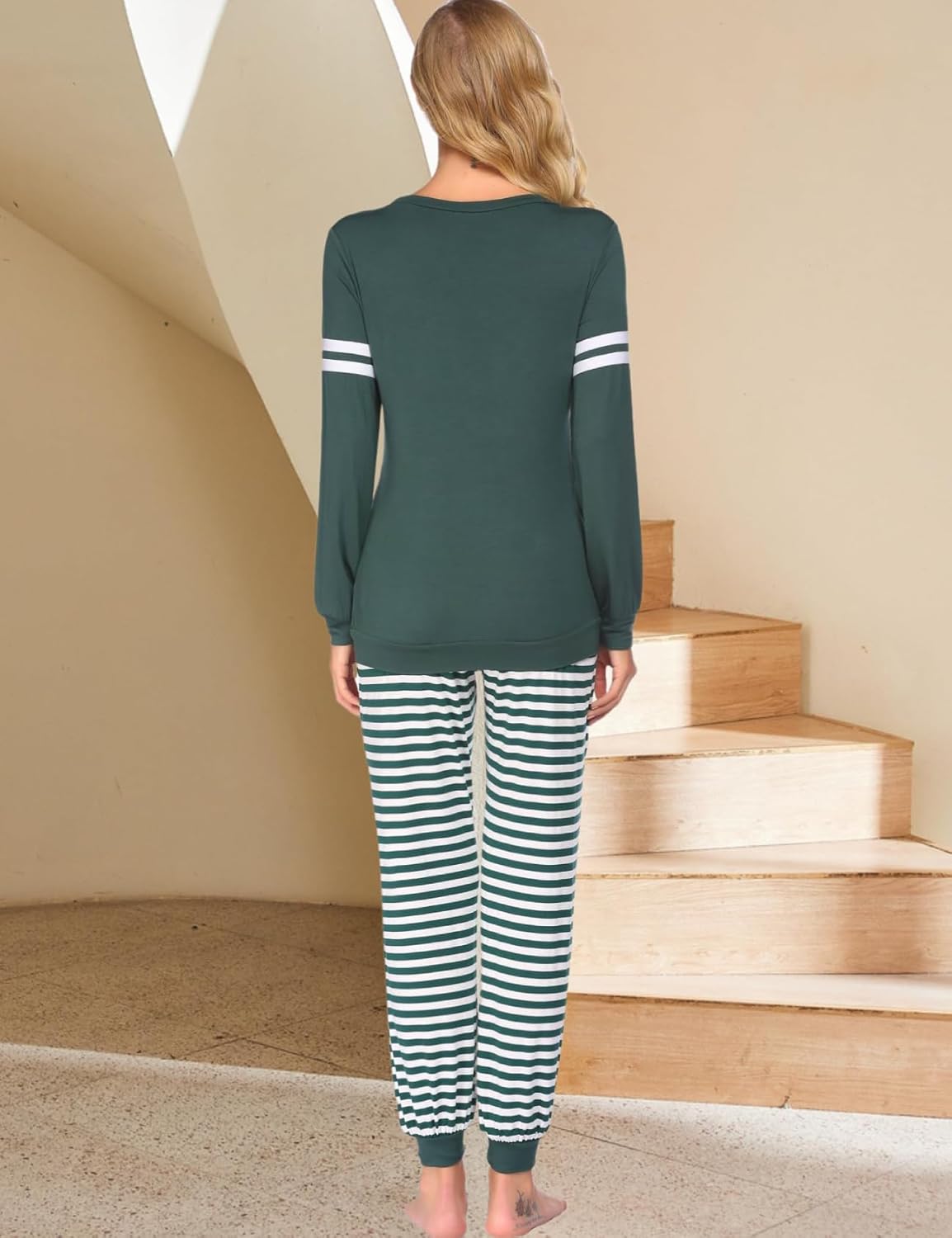 Maternity nursing pajama set from back: dark green long-sleeve top with striped pants