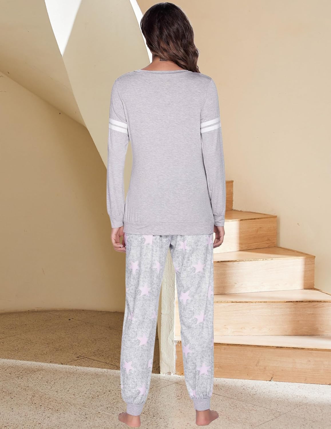Back view: light grey nursing pajama set with pink star print jogger pants