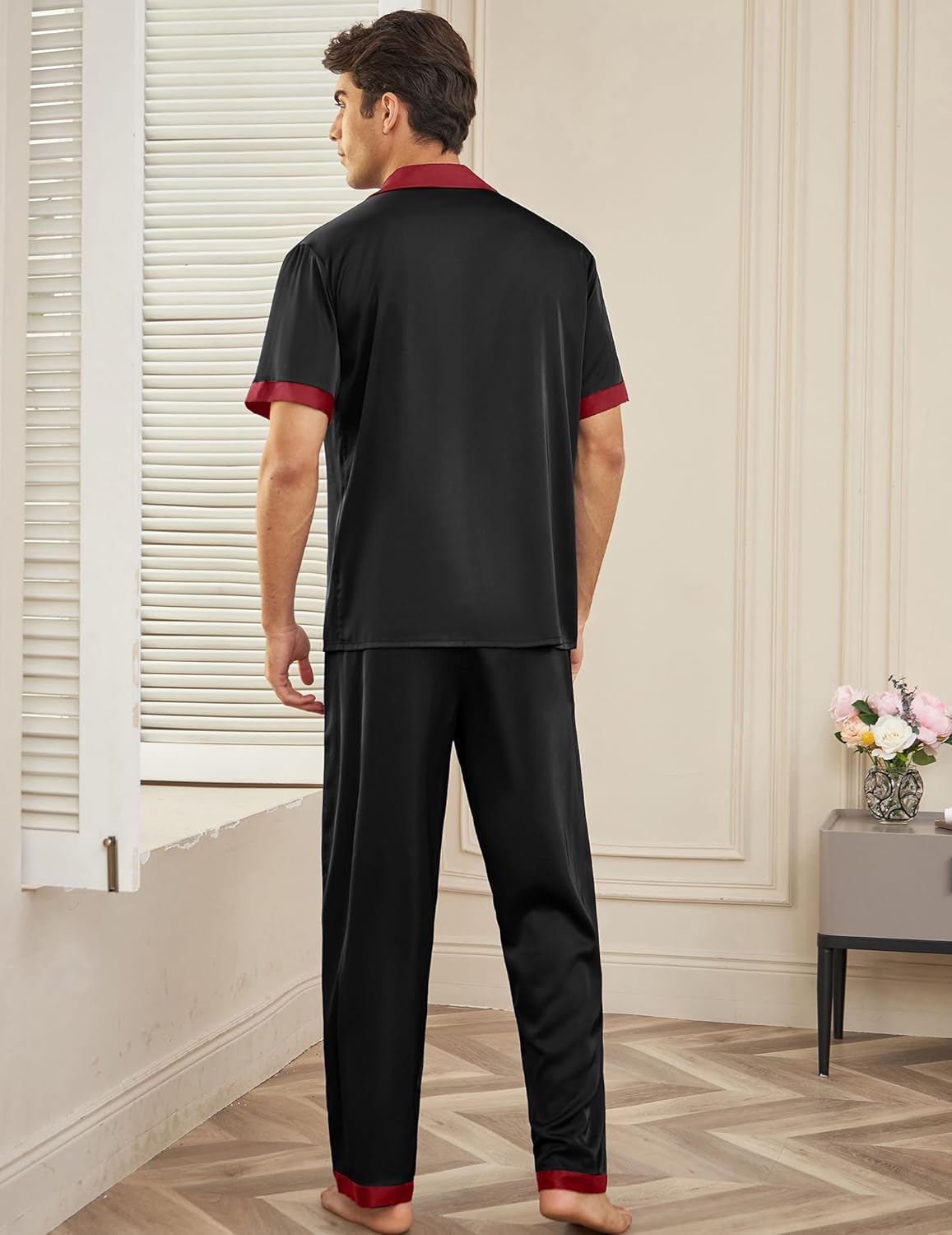 Men’s satin silk pajama set, black back view with red-trim cuffs and matching trousers
