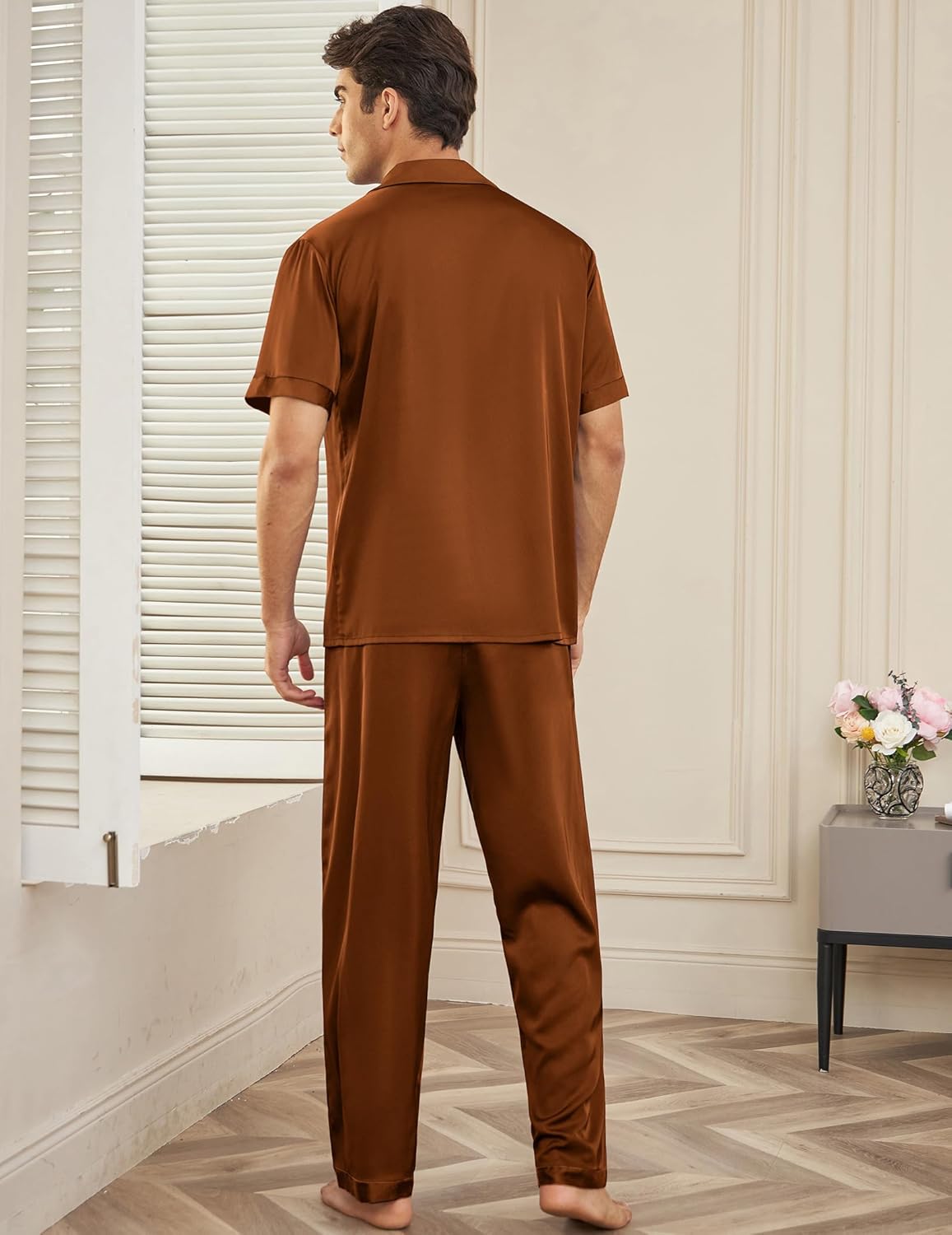 Brown satin silk pajama set, back view with short-sleeve button shirt and long pants