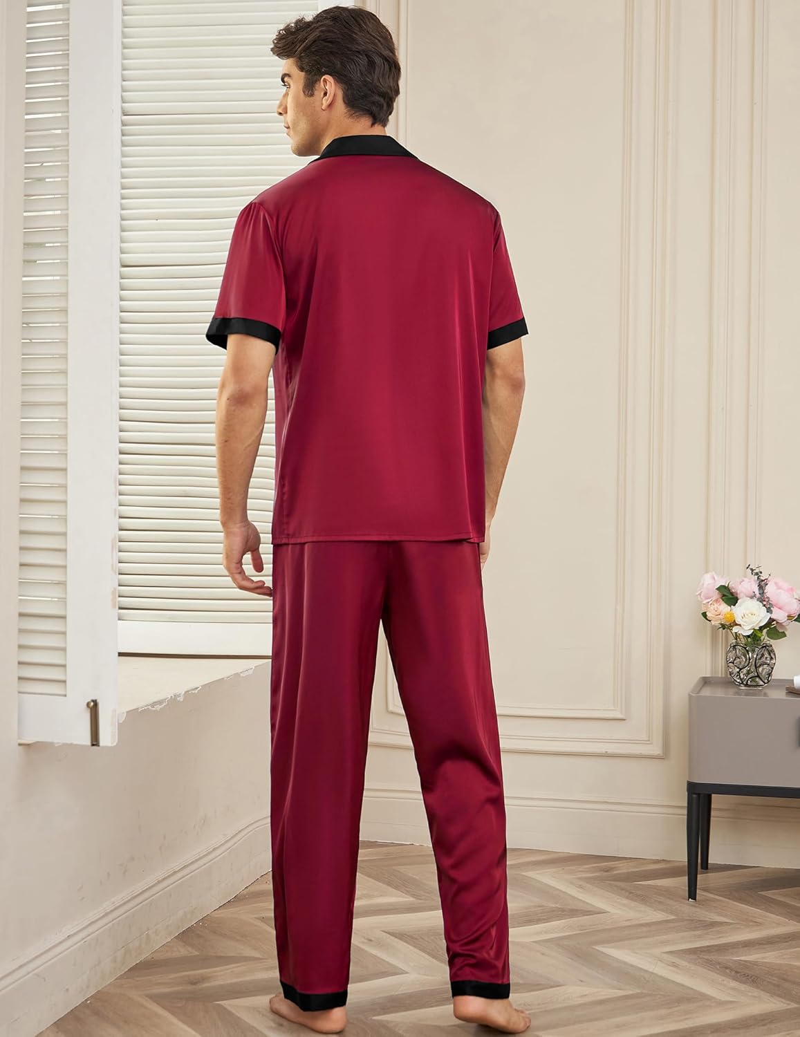 Men’s satin silk pajama set, deep red back view with black-trim sleeve cuffs and pants