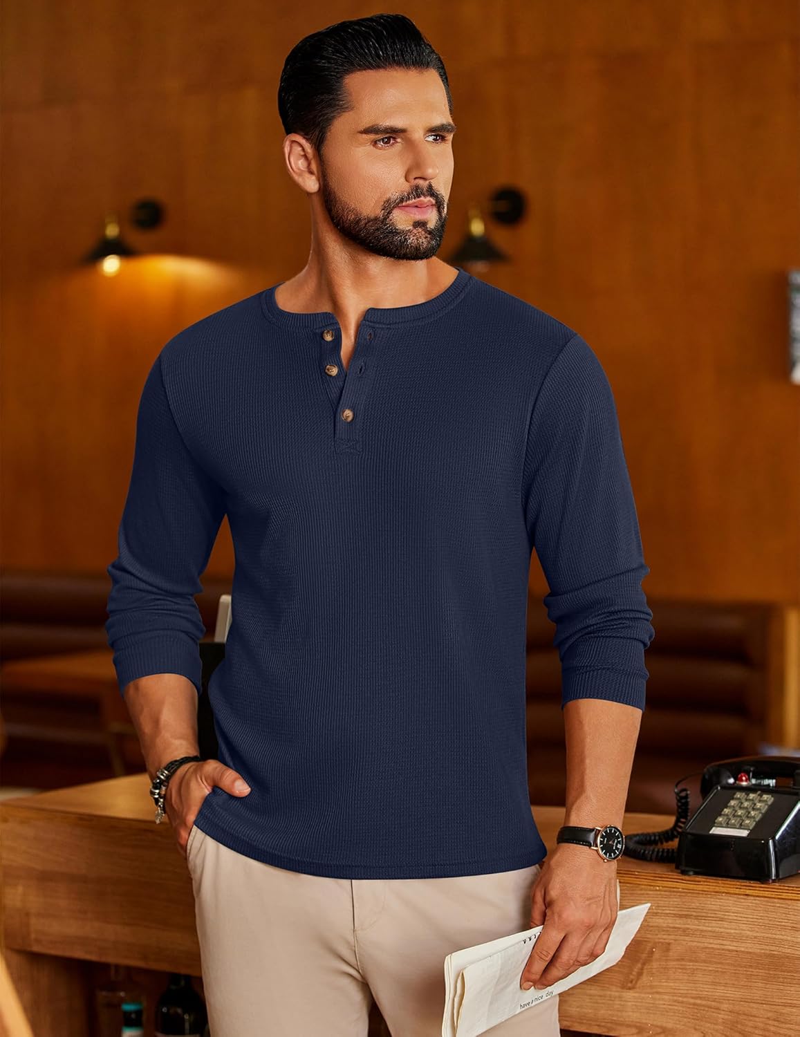 Navy blue waffle henley long-sleeve shirt with button placket and ribbed collar