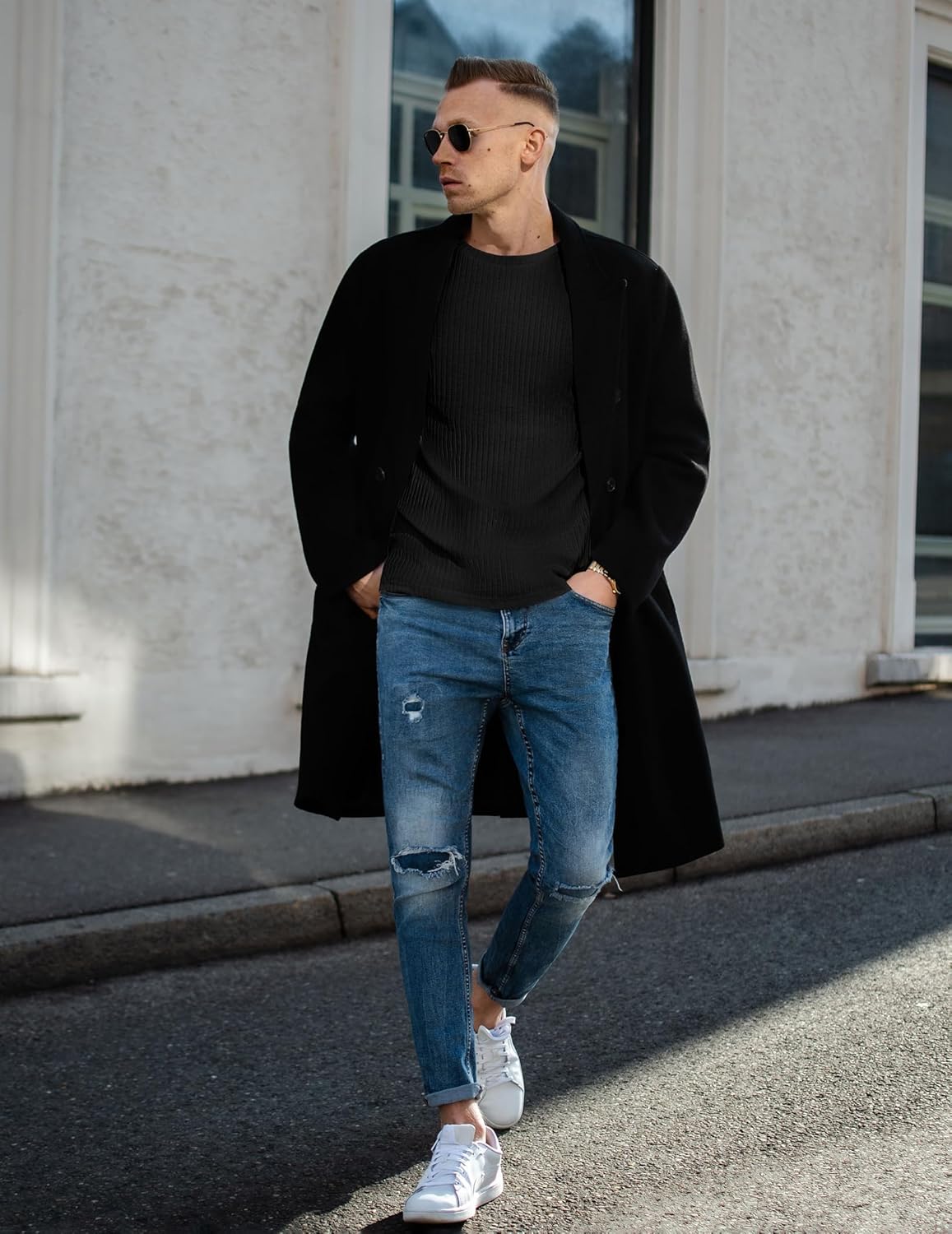 Men's black ribbed long-sleeve crewneck sweater, close-up front