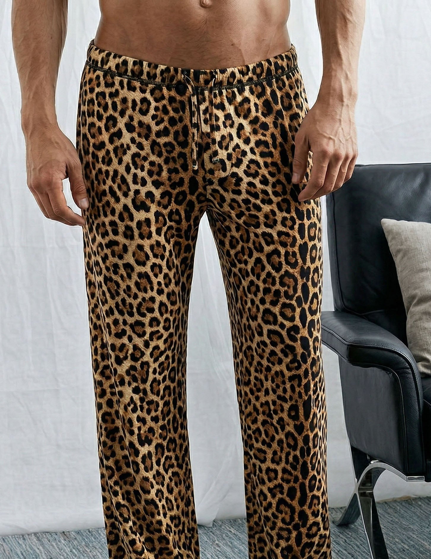 Men's lounge pants, full-length leopard print, drawstring waist, tapered legs.