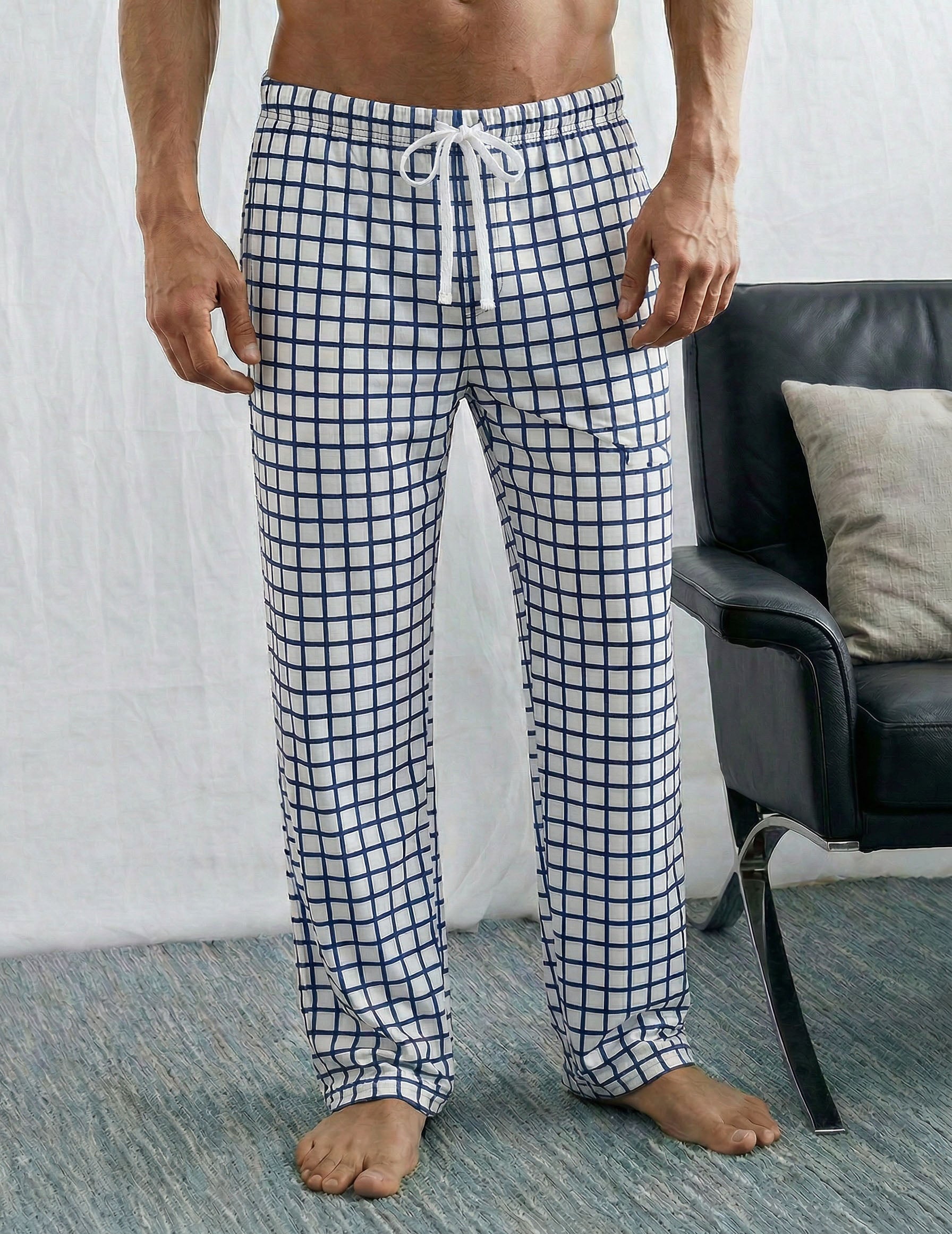 Men's lounge pants, blue grid plaid, drawstring waist, tapered legs.