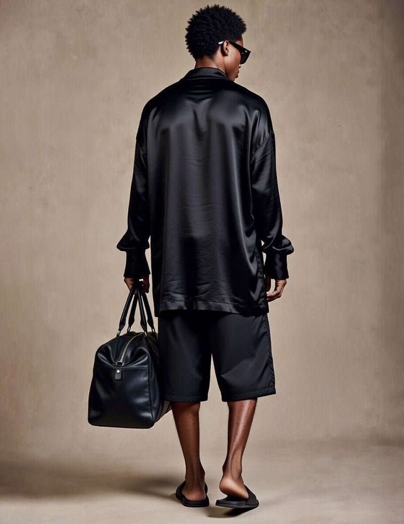 Men's loungewear shirt and shorts set in dark satin-look, back view with short sleeves and shorts