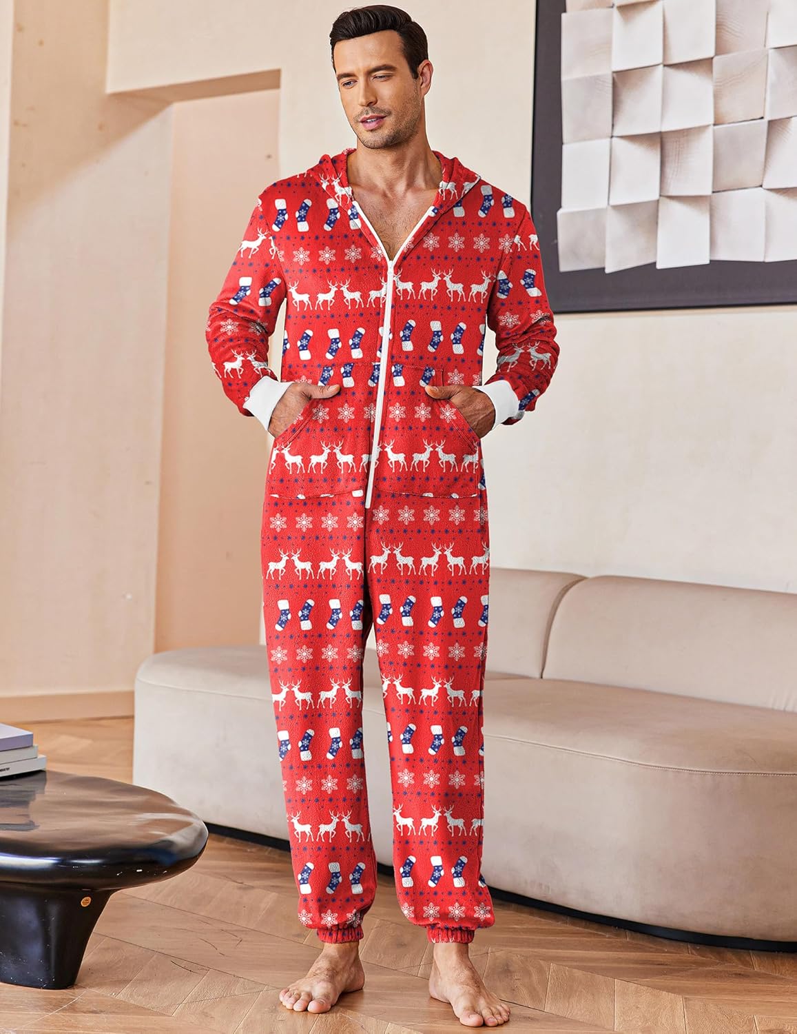 Men’s red hooded fleece onesie pajama, zip front and full-length festive print