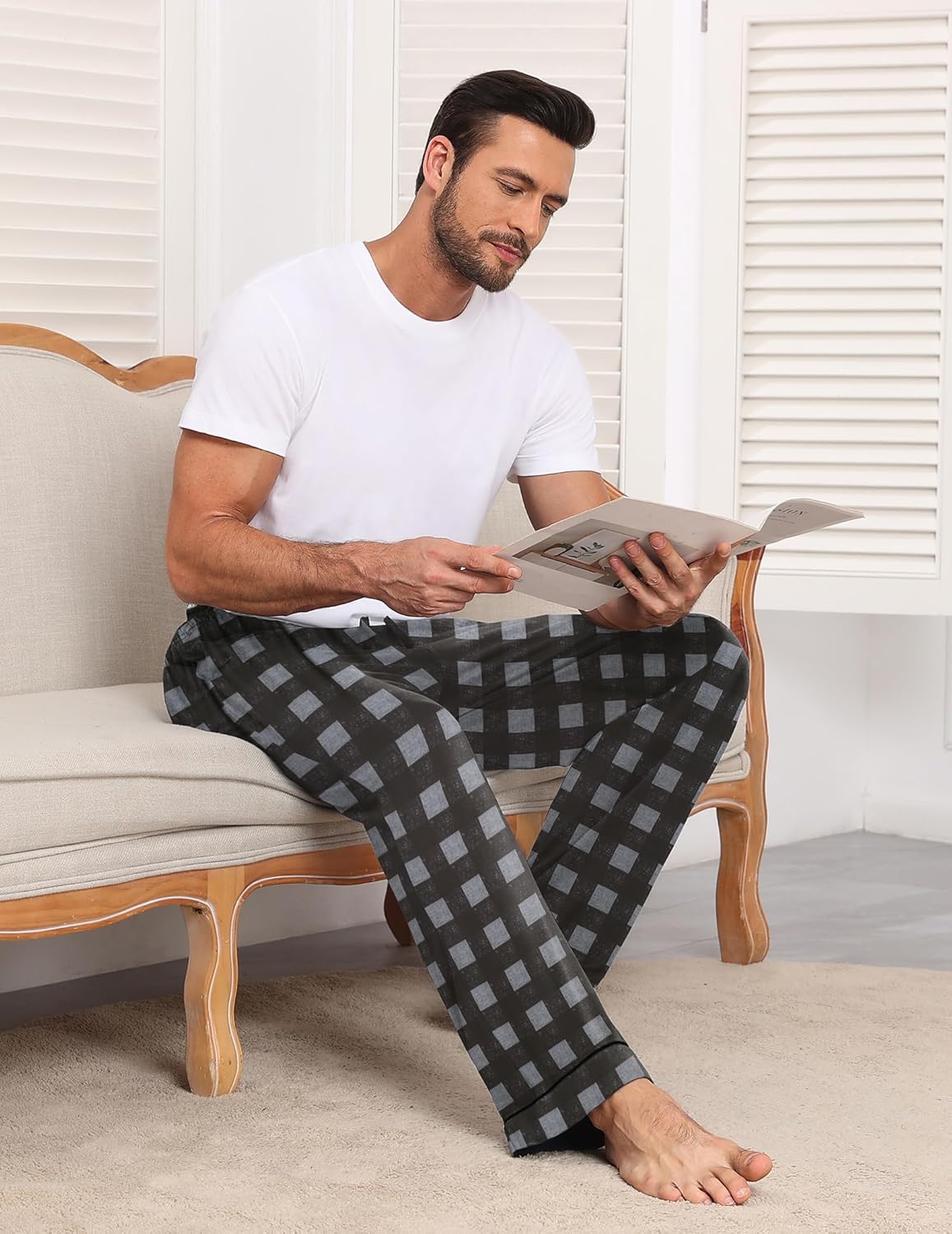 Mens pajama bottoms in black-and-gray plaid squares with drawstring waist