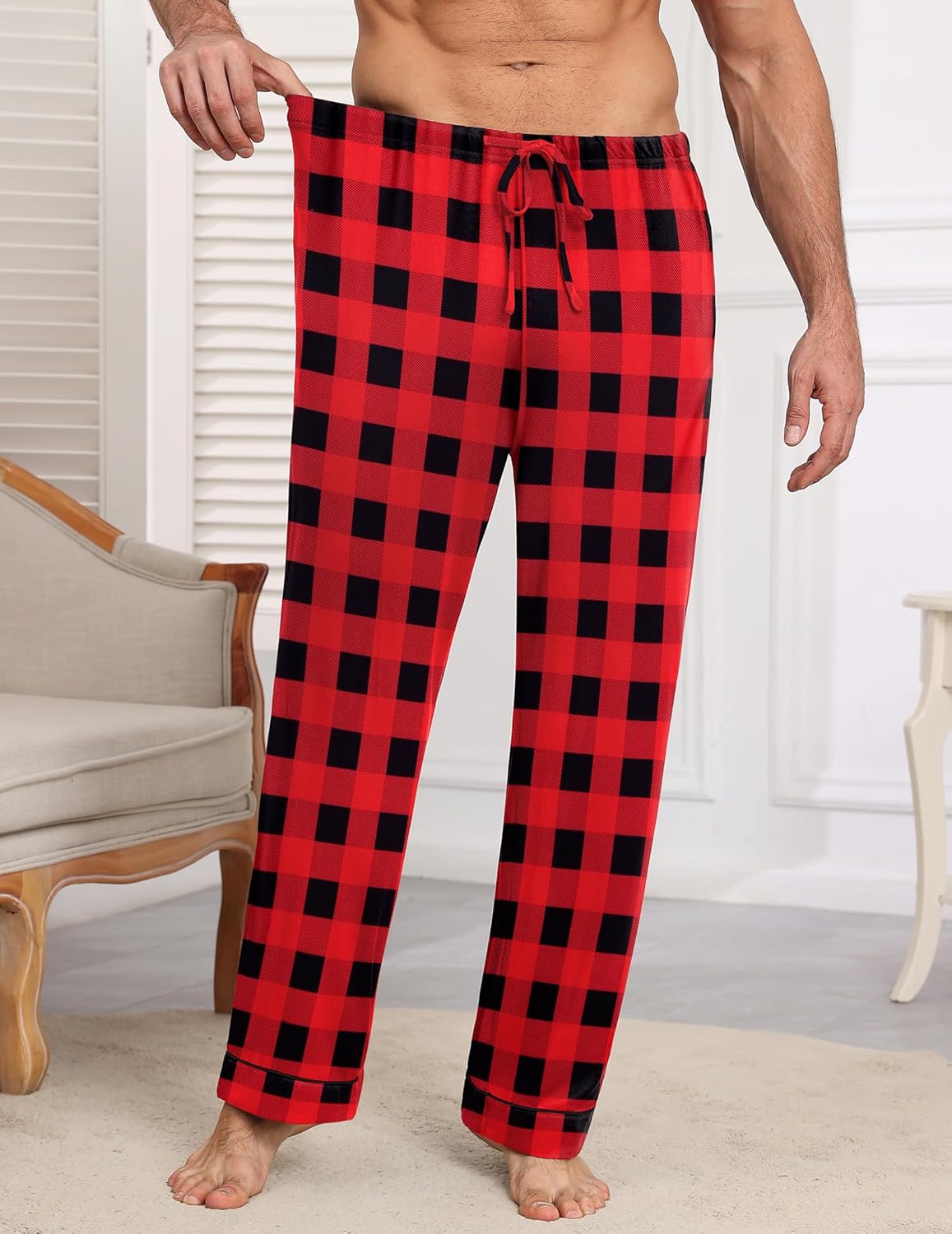 Mens red-and-black plaid pajama bottoms with drawstring tie at waist