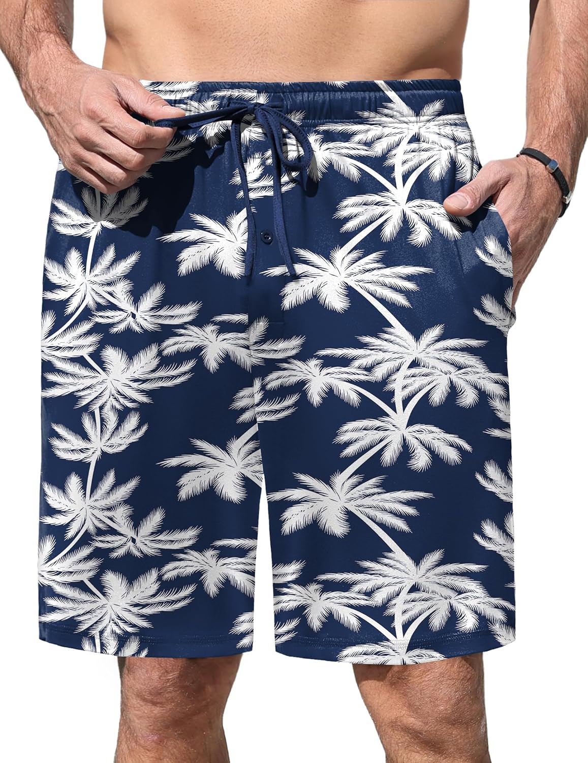 Navy pajama shorts with white palm leaf print and drawstring waist