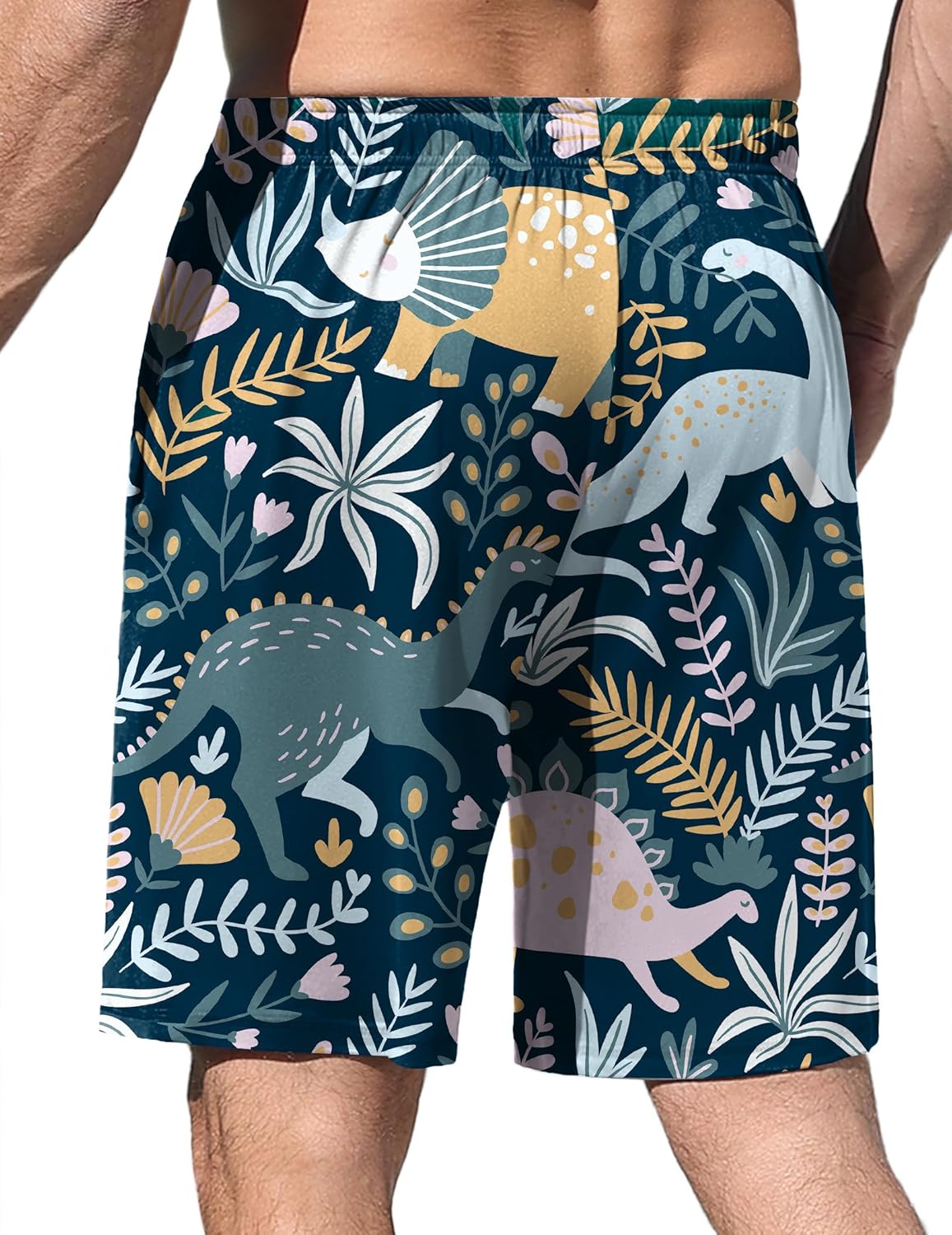 Blue pajama shorts with layered jungle animal silhouettes and foliage print
