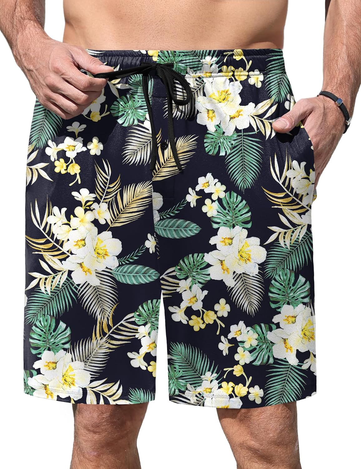 Black pajama shorts with tropical flowers and green palm leaf print