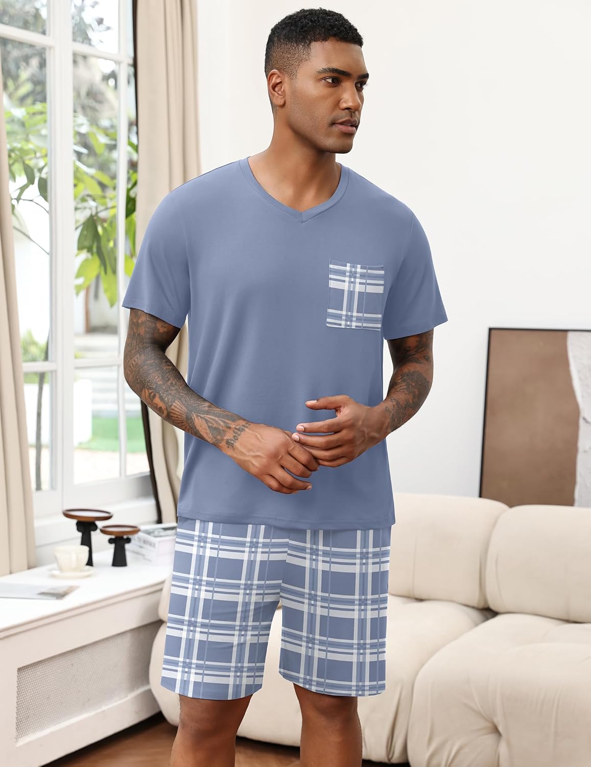 Light blue V-neck lounge set with plaid shorts and chest pocket detail.