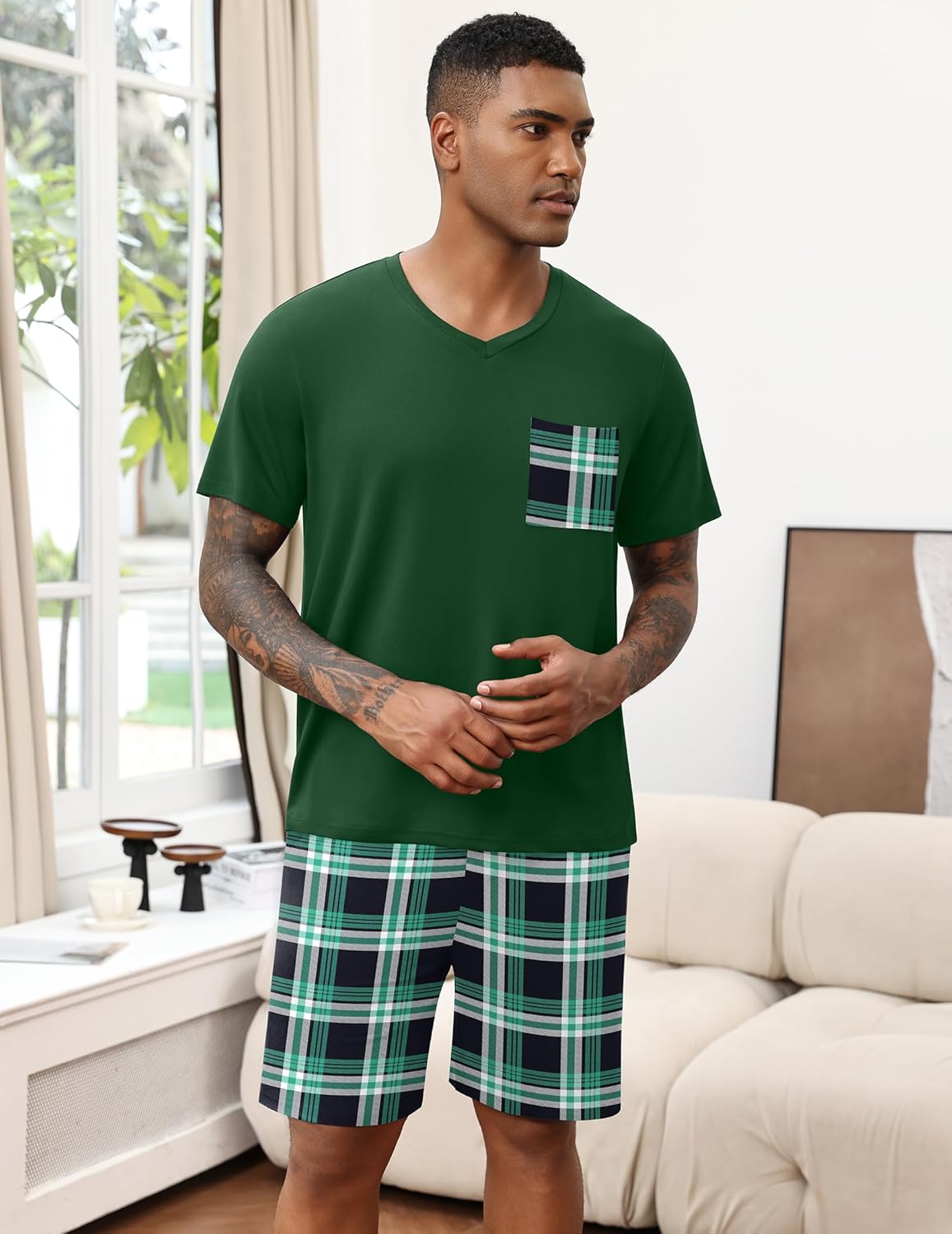 Green V-neck pajama set with chest pocket and plaid shorts