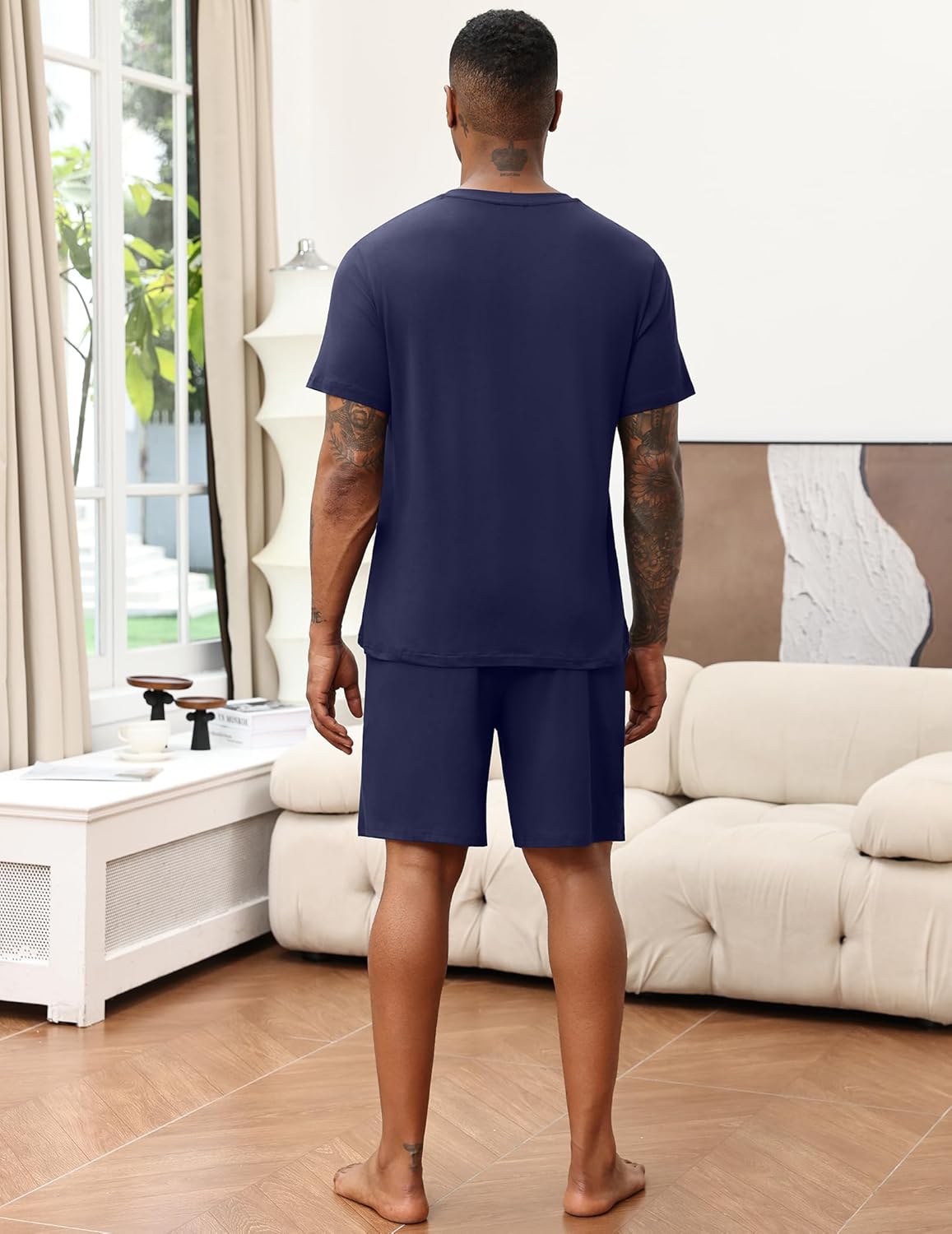 Navy pajama set with V-neck top and knee-length shorts, back view