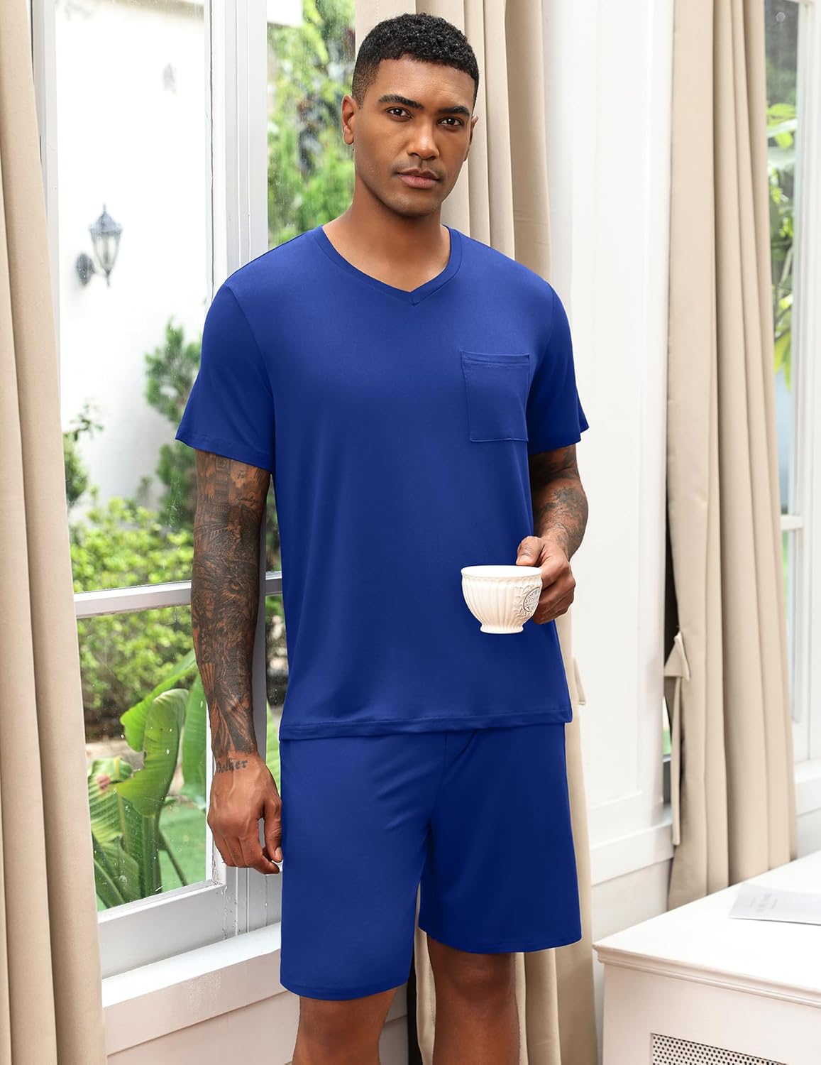 Royal blue men's V-neck pajama set with chest pocket and solid shorts.