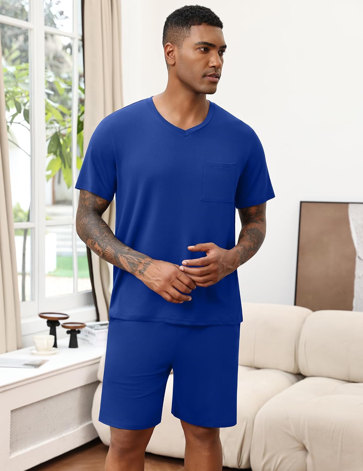 Deep blue men's pajama set with V-neck T-shirt and solid matching shorts.