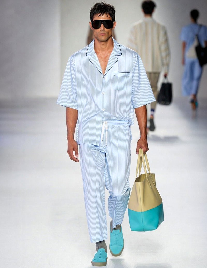 Light blue pinstripe men’s pajama set with short-sleeve shirt and drawstring pants