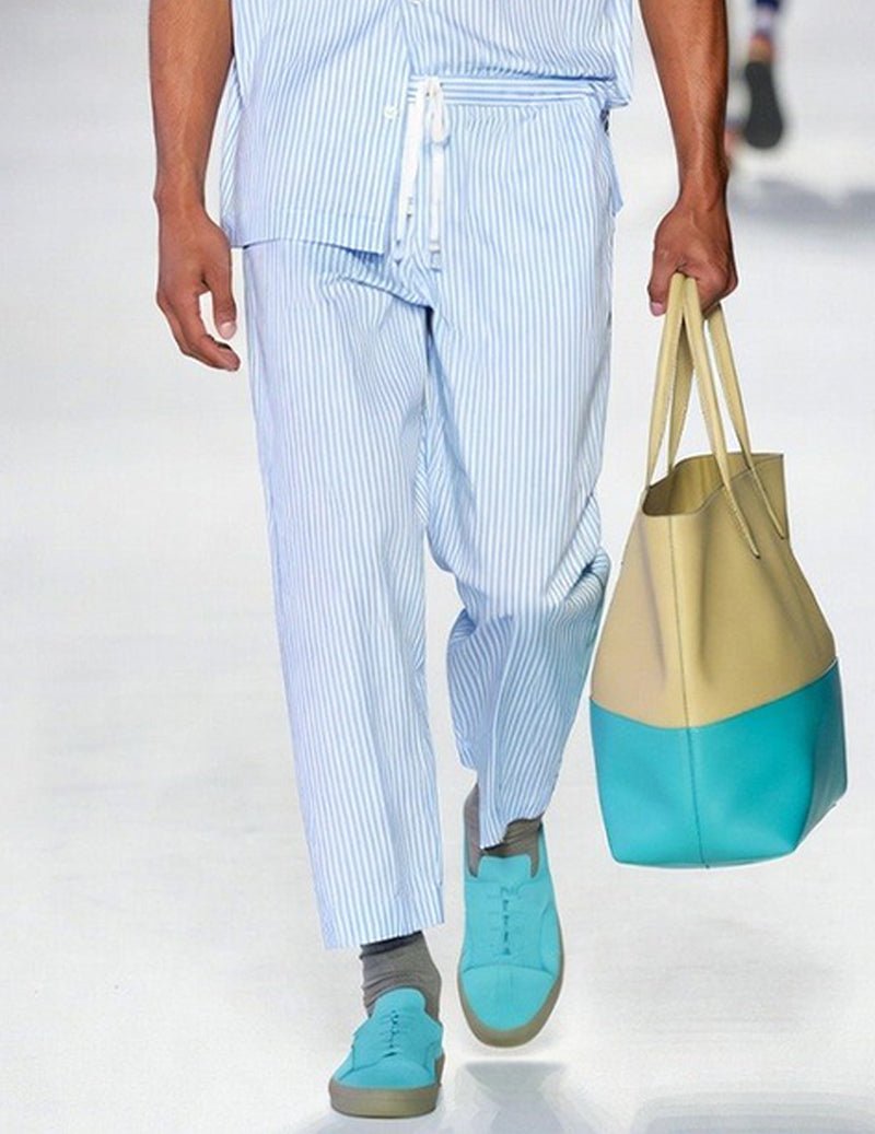 Light blue pinstripe pajama pants with drawstring waist and ankle-length legs
