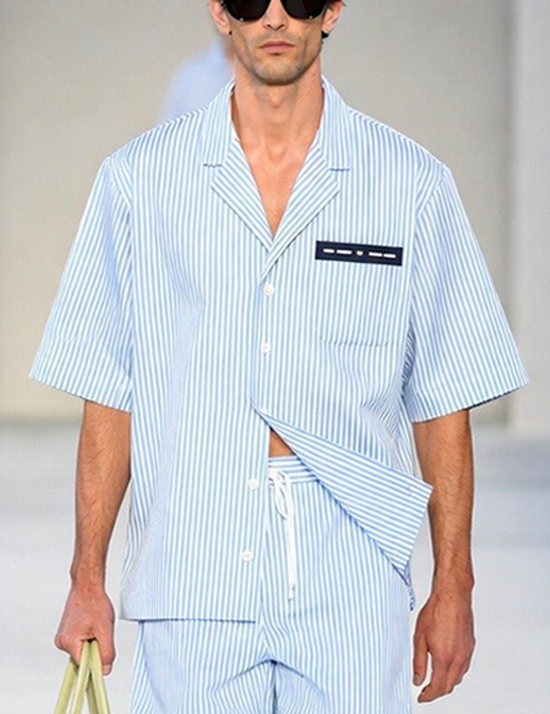 Light blue pinstripe short-sleeve shirt with pocket and contrasting trim, matching shorts