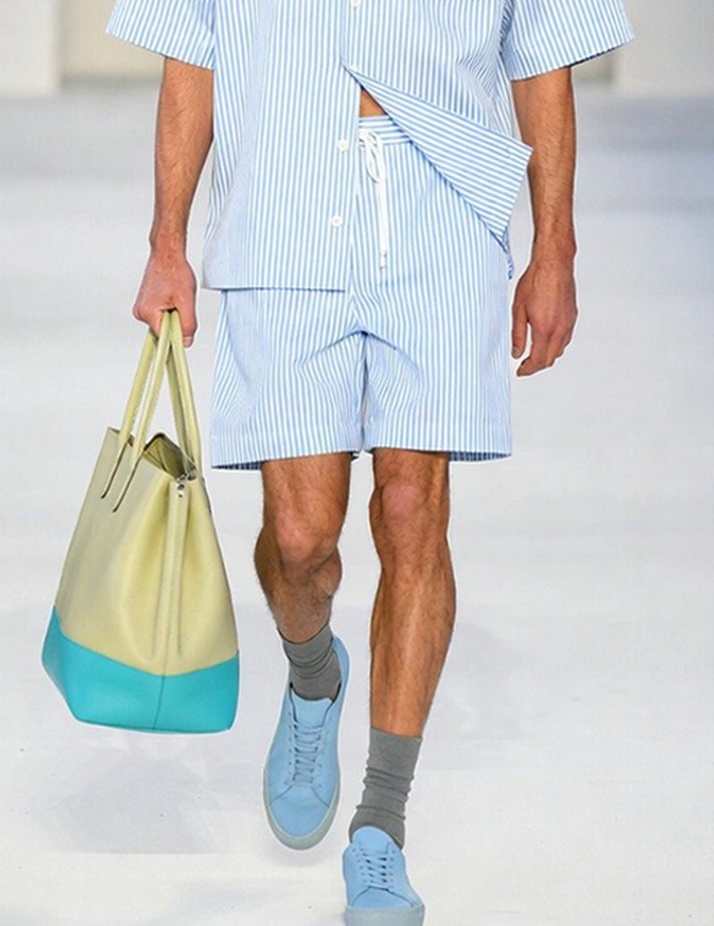 Light blue pinstripe shorts with contrasting trim and side drawstring