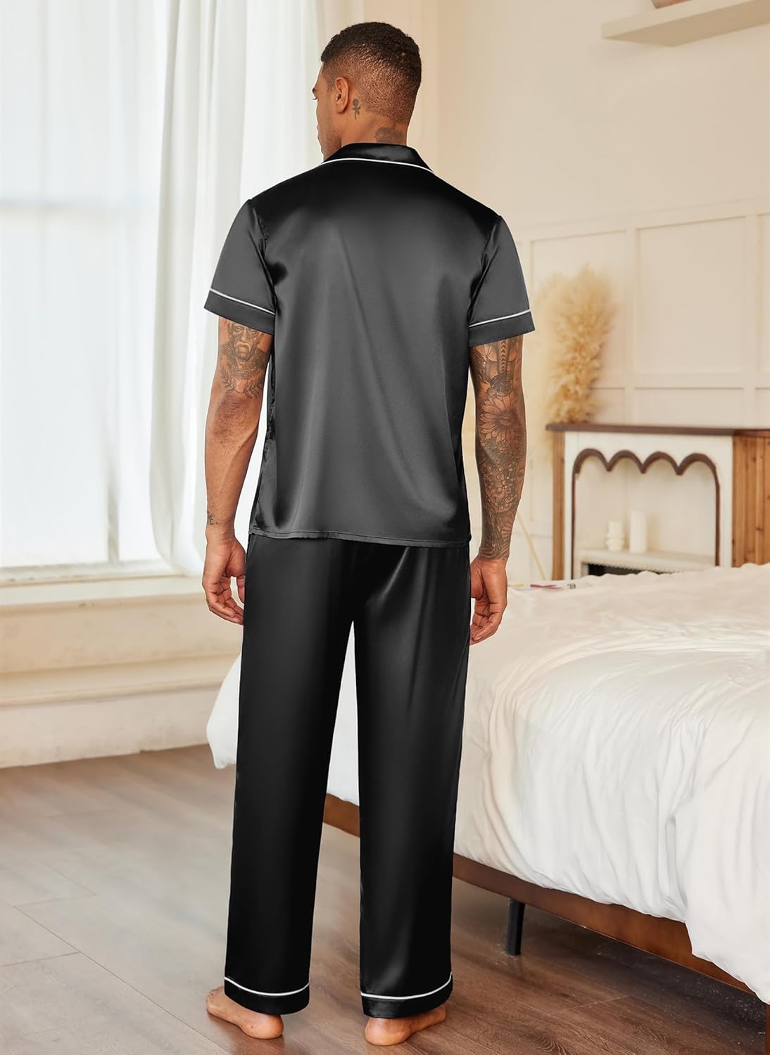 Mens satin pajama set, black short-sleeve button top and long pants, back view