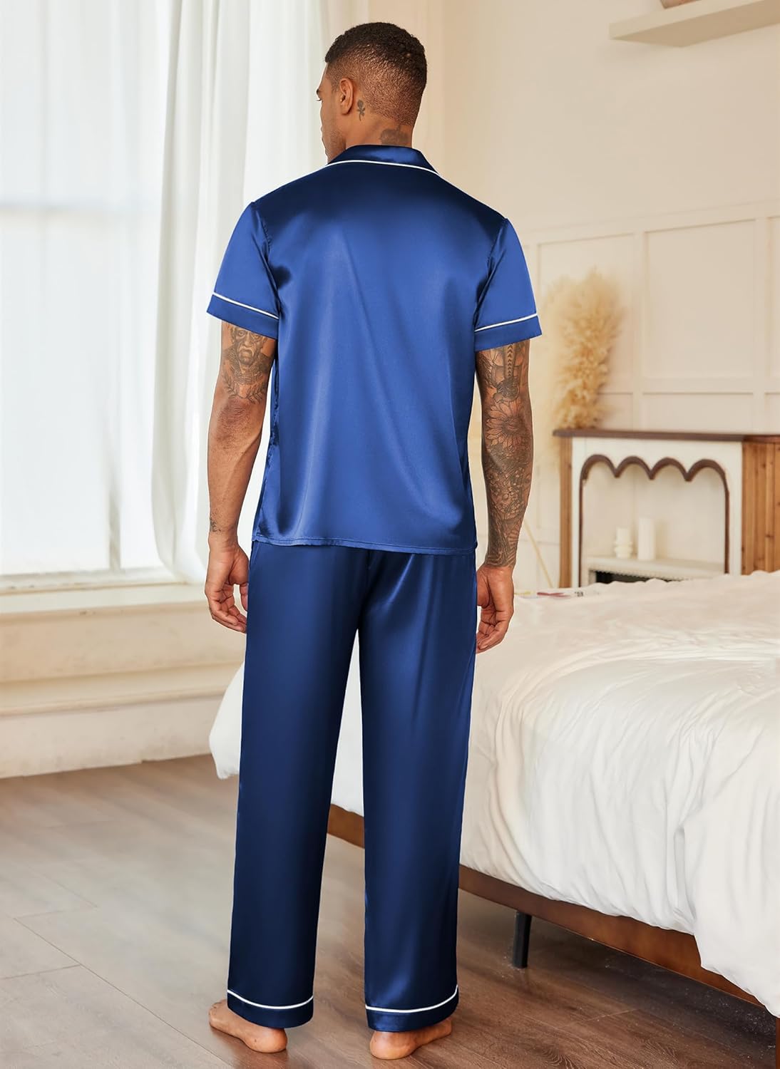 Mens satin pajama set, navy blue short-sleeve button top and long pants, back view