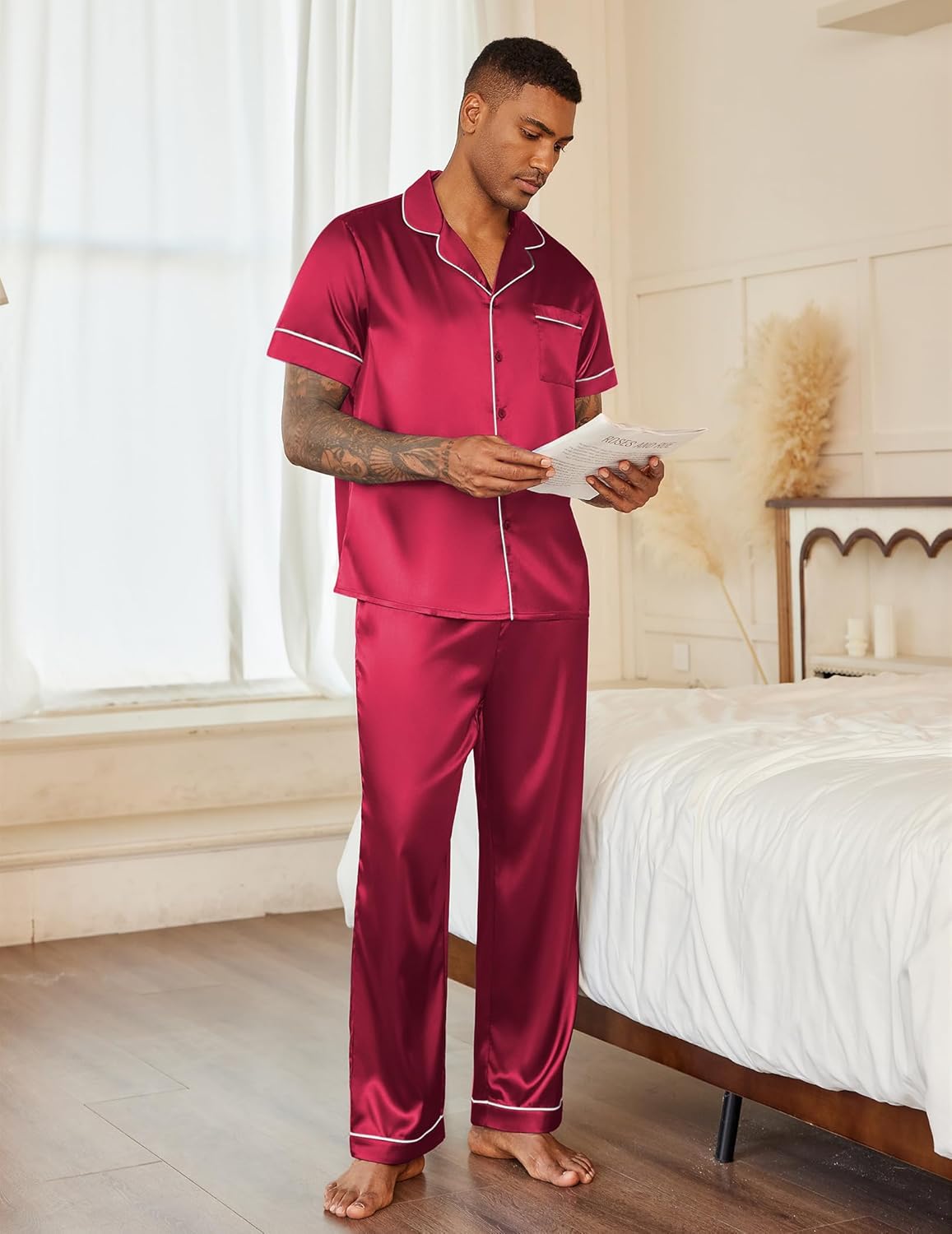 Men’s red satin pajama set: short-sleeve button-up and long pants with contrast piping