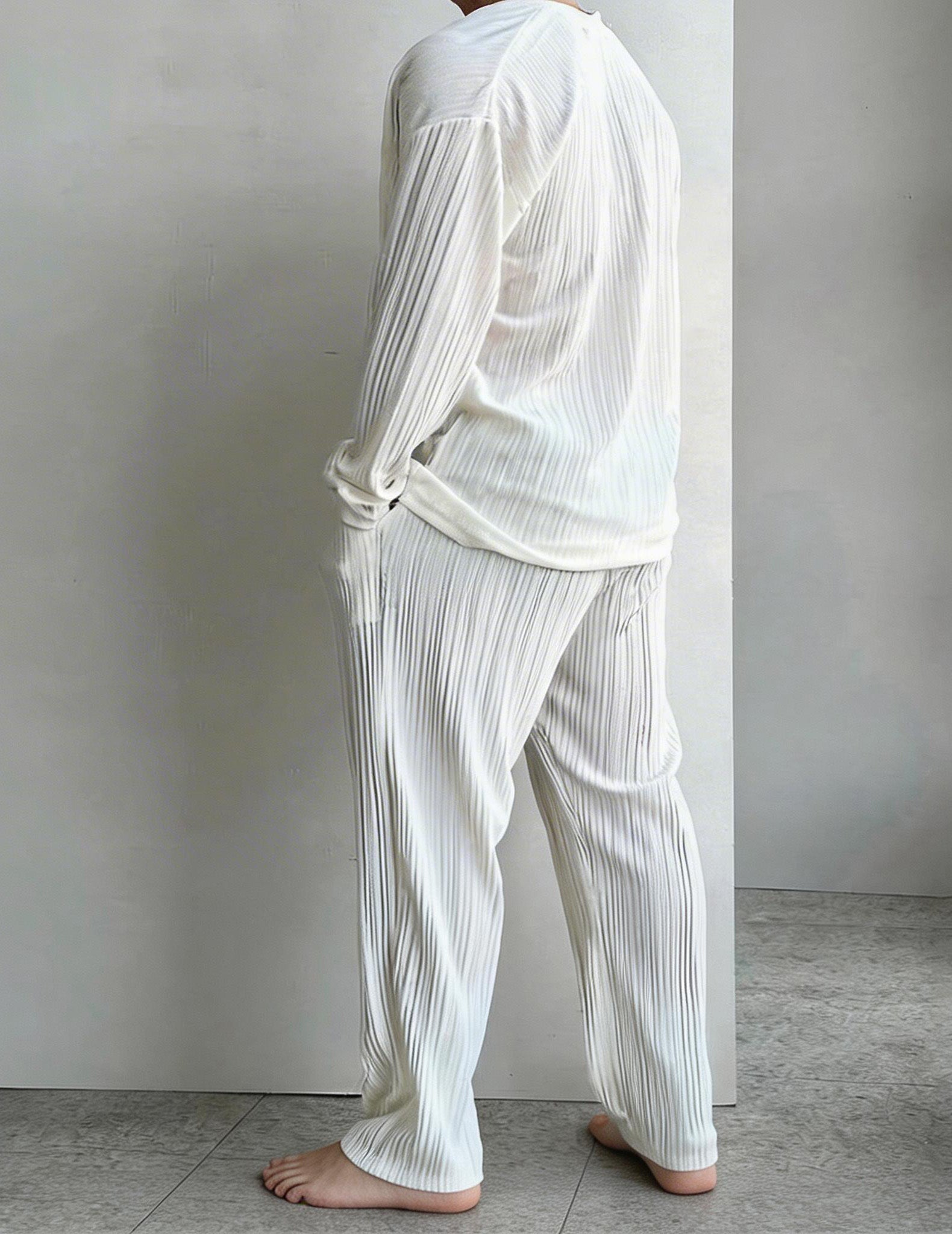 Men's white pleated shirt and pants set with relaxed fit and stripe texture