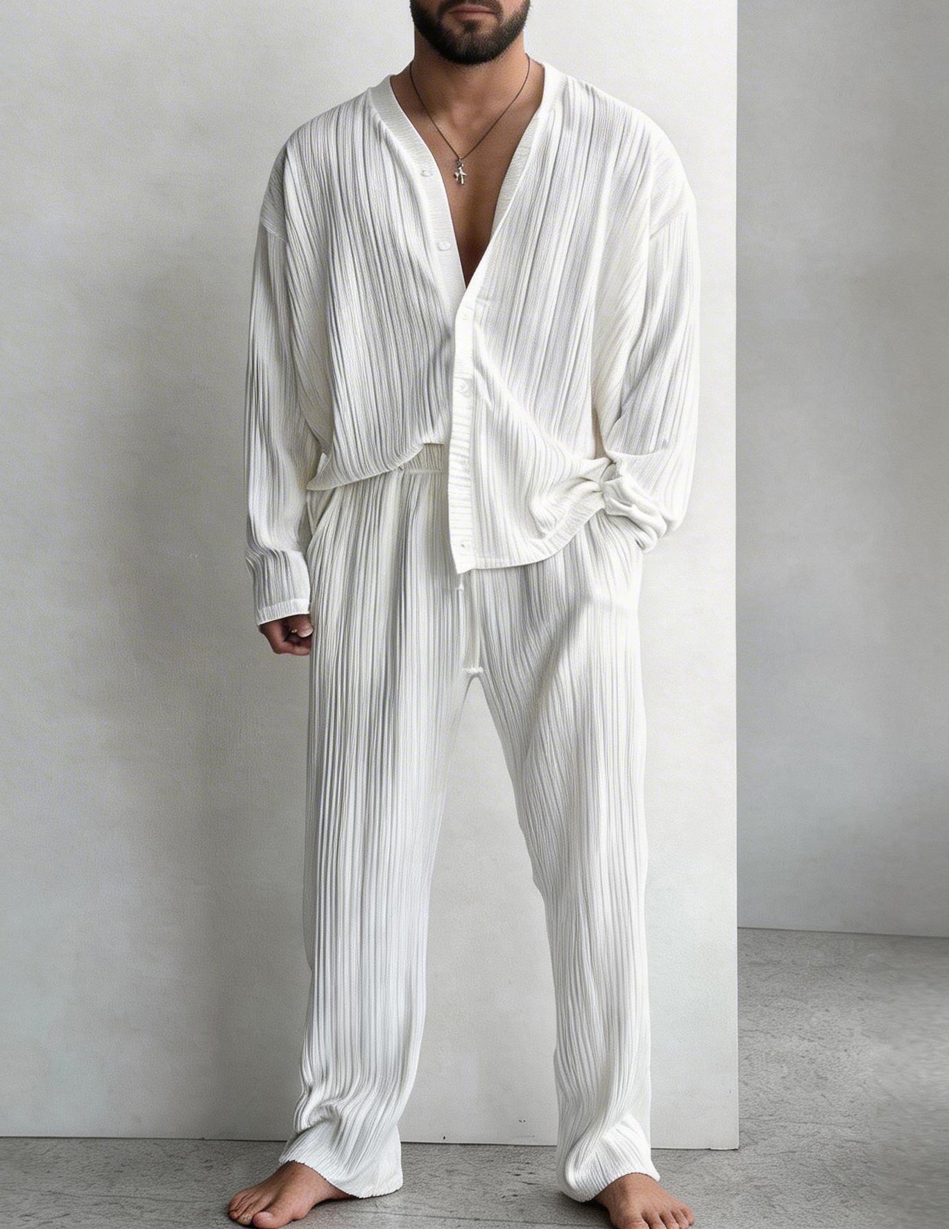 Men's white pleated shirt and pants set with button front and long sleeves