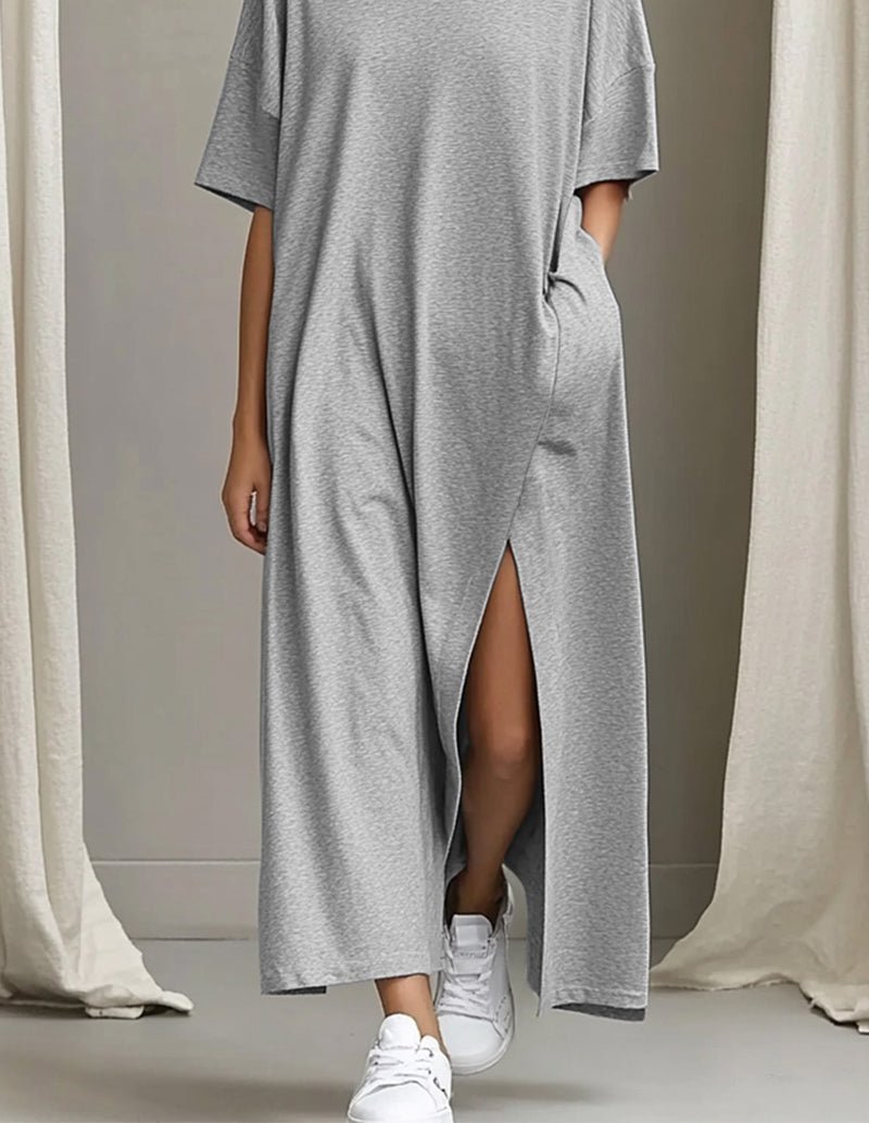 Light gray maxi dress showing deep side slit and side pocket, short-sleeve crew neck