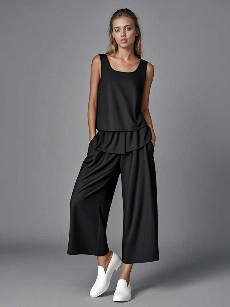 Black tank top and wide-leg pants set with layered flounced hem