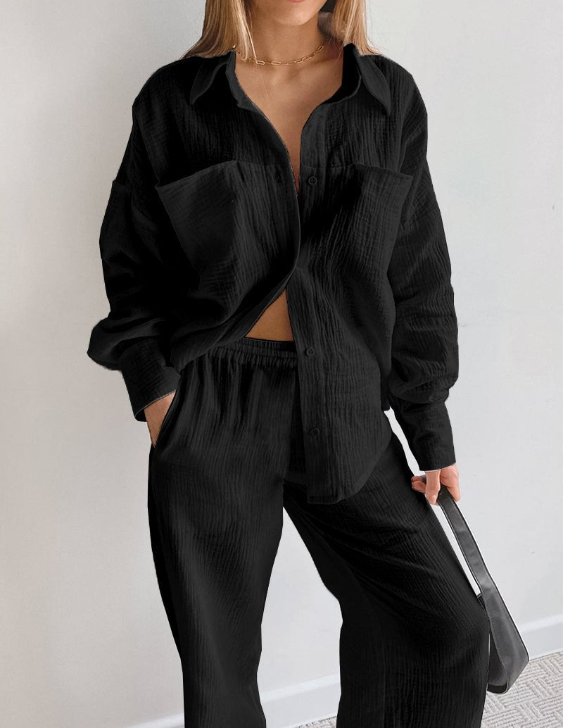 Black cotton lounge set with button-front shirt and matching drawstring waist pants