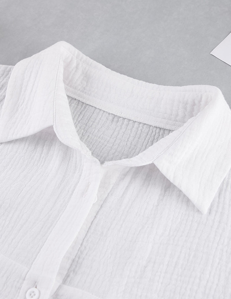 White cotton lounge shirt collar and shoulder detail with textured fabric