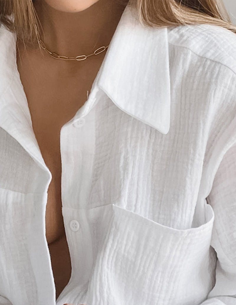 White cotton lounge shirt with button placket and chest pockets
