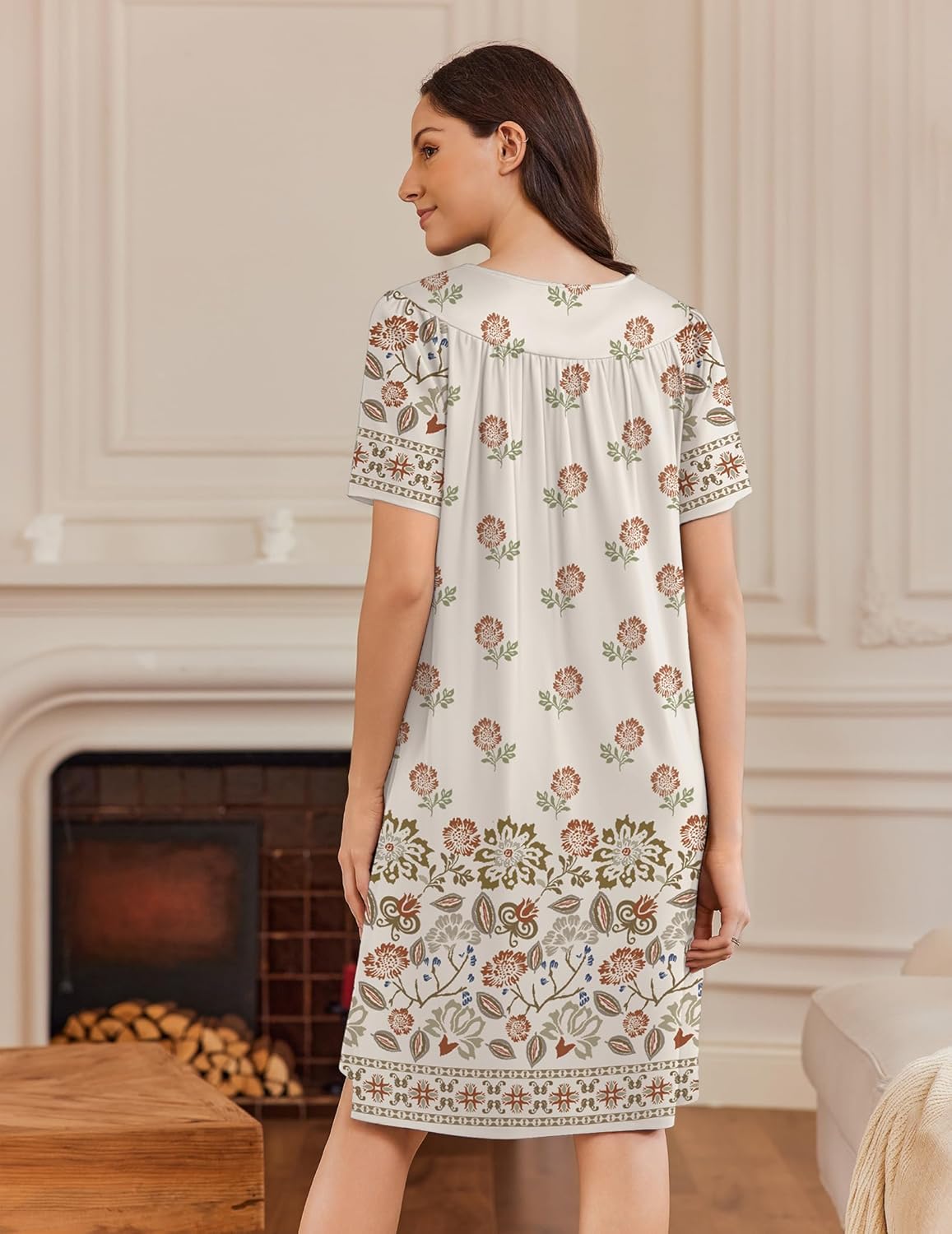 Cream button-front house dress with short sleeves and allover floral print, back view