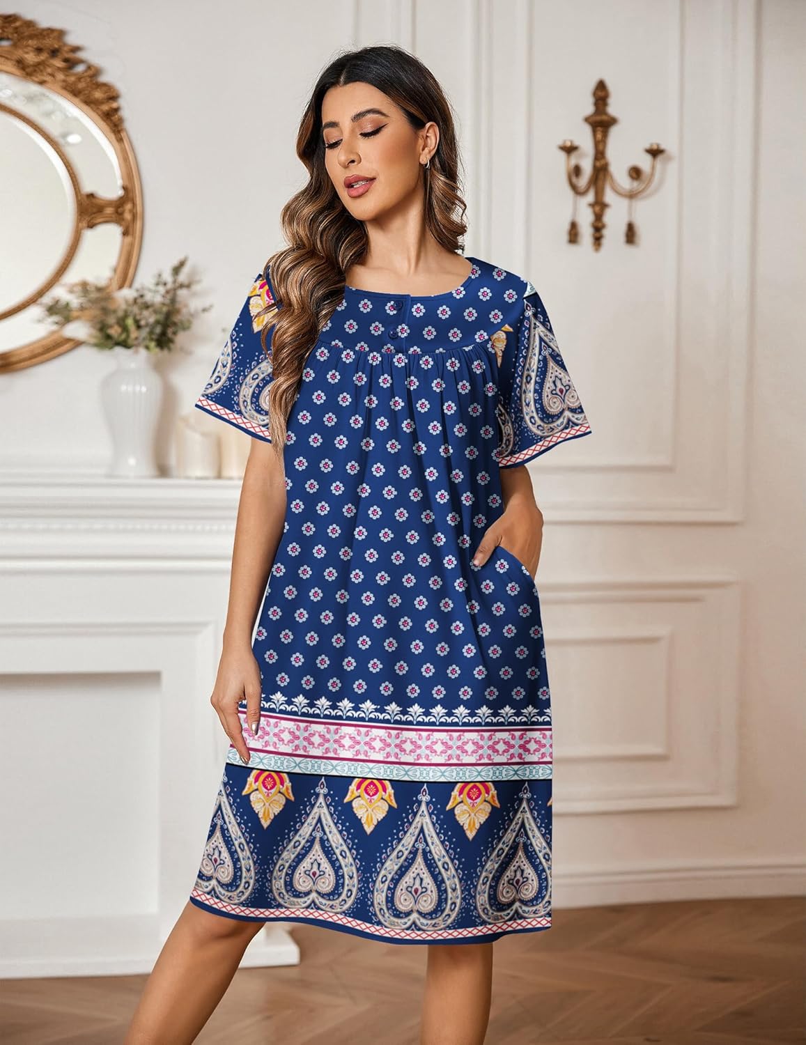 Navy blue button-front house dress with ornate border print, short sleeves, side pockets.