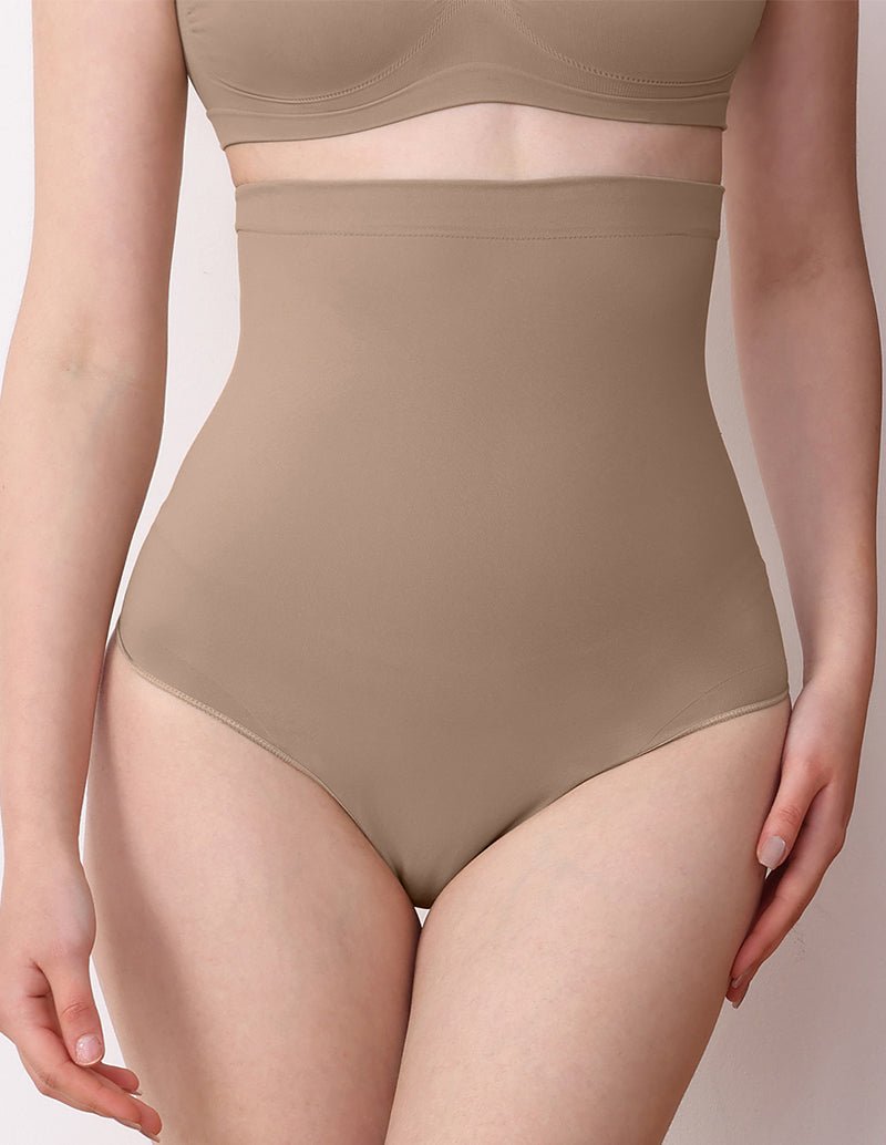 Tummy control shapewear brief beige, high-waist full coverage on model