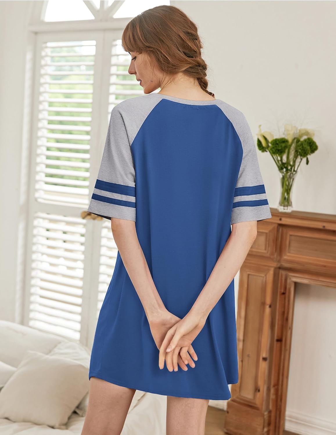 Blue color block pajama dress, back view with light gray sleeves and striped cuffs