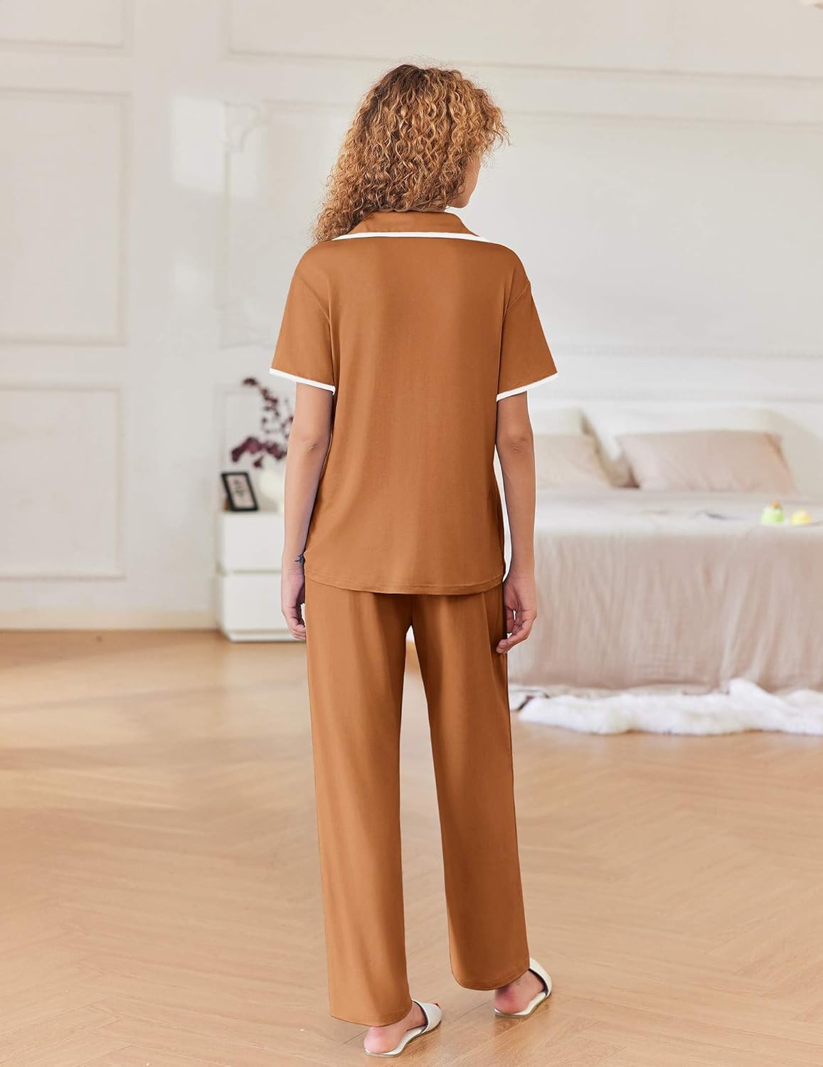 Khaki pajama set with short-sleeve top and long pants, viewed from the back.