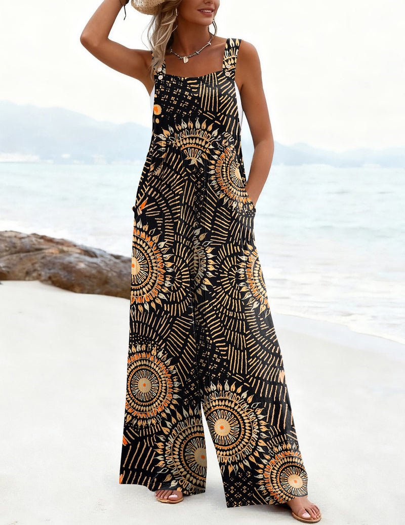Wide-leg jumpsuit in black with orange circular medallion print