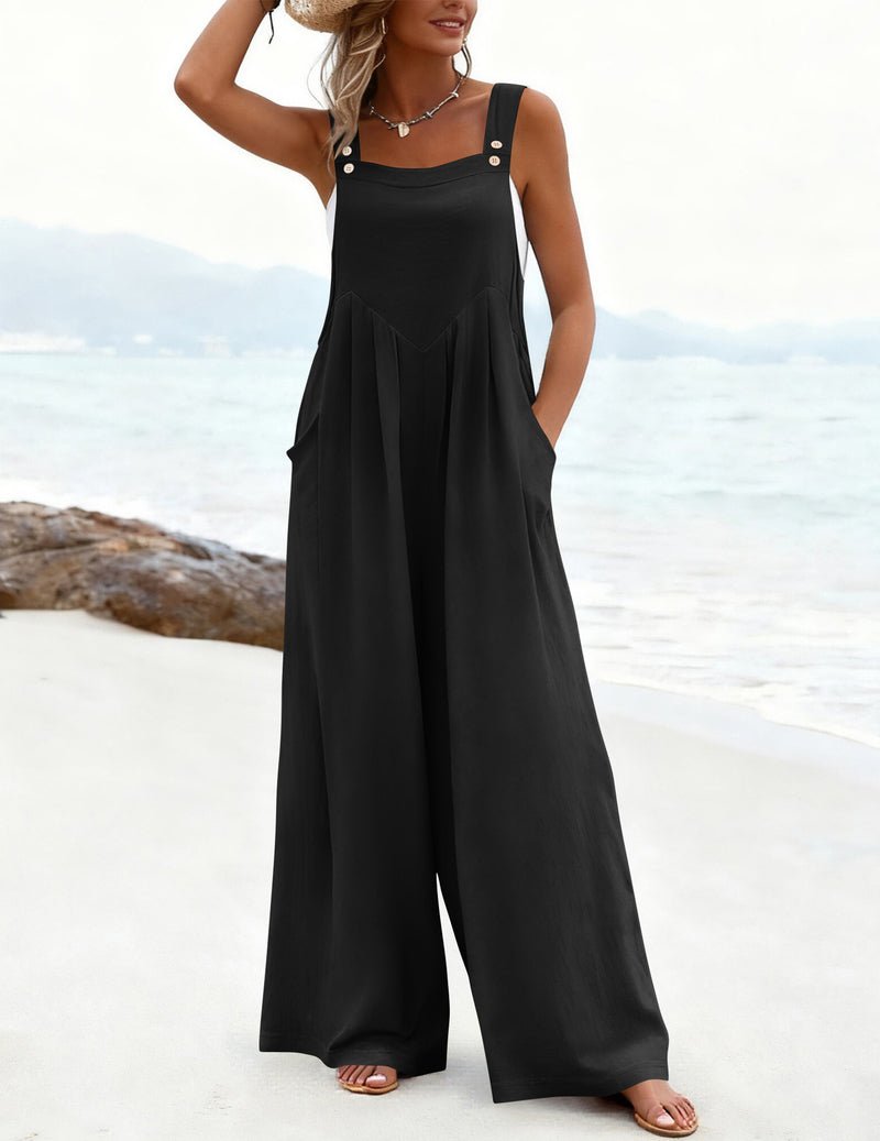 Schwarzer Jumpsuit mit Trägern, weiten Hosenbeinen und Knöpfen an den Trägern