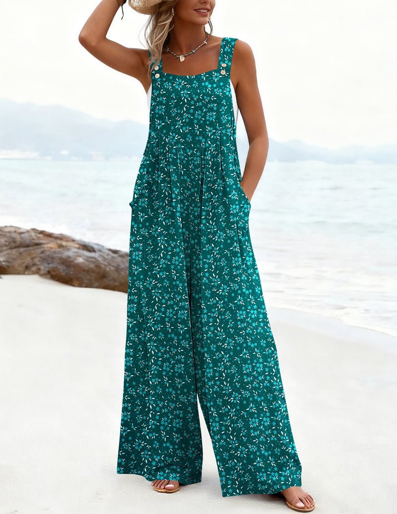 Teal green floral wide-leg jumpsuit with square neckline and button-strap bib