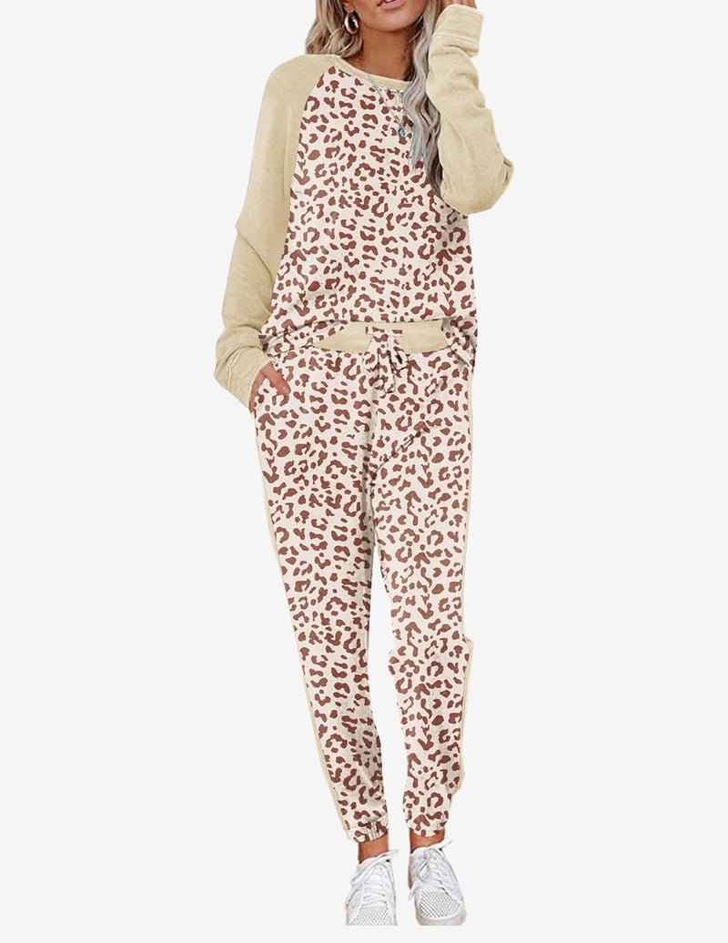 Leopard print pajama set with long sleeves and matching pants in beige and rust tones