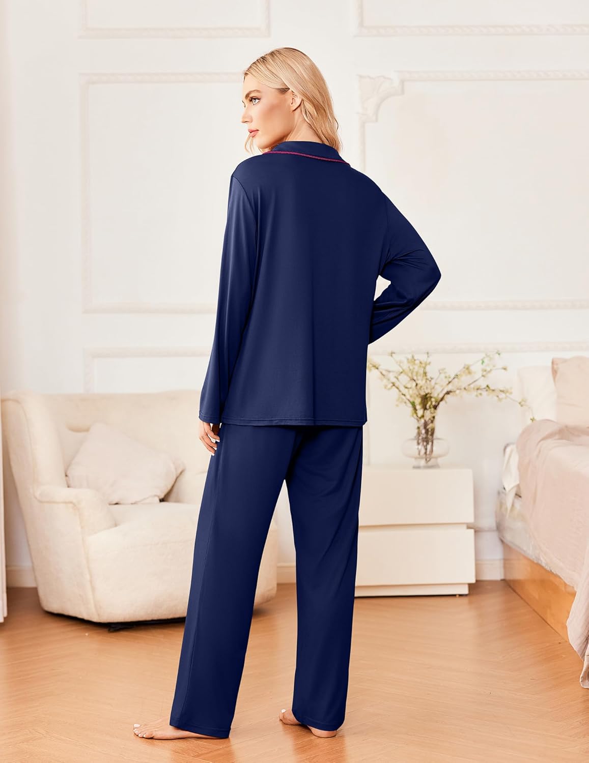 Navy blue long-sleeve pajama set with contrasting trim, button-up top and wide-leg pants