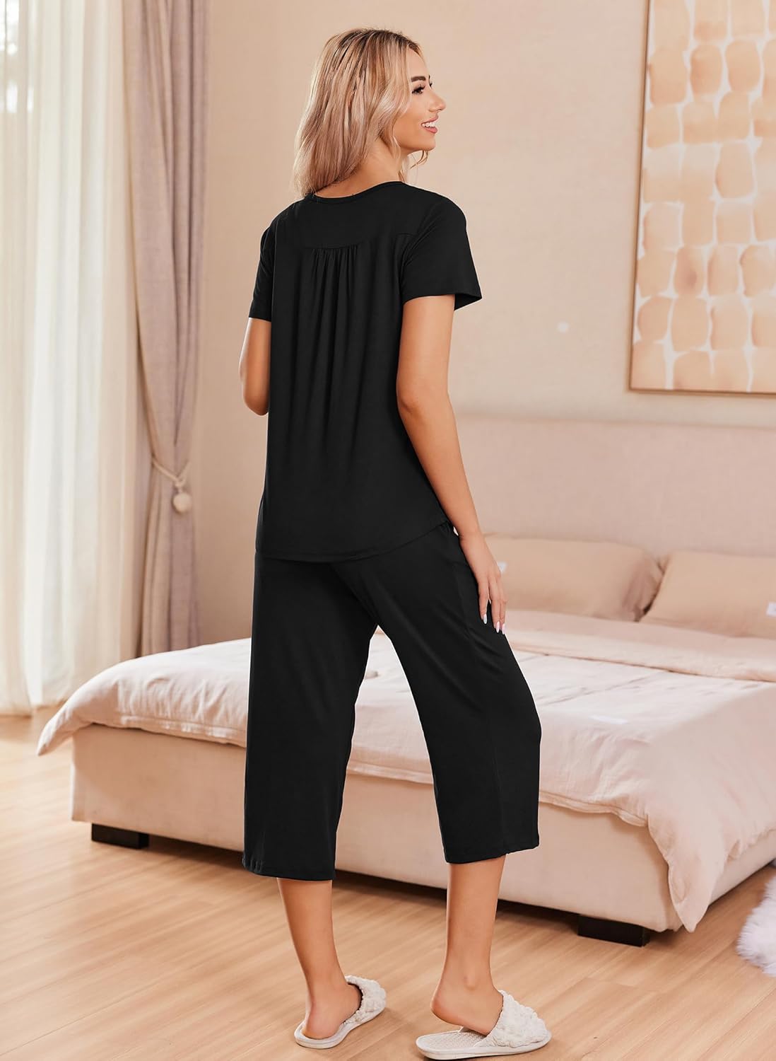 Black pajama set with short-sleeve top and capri pants