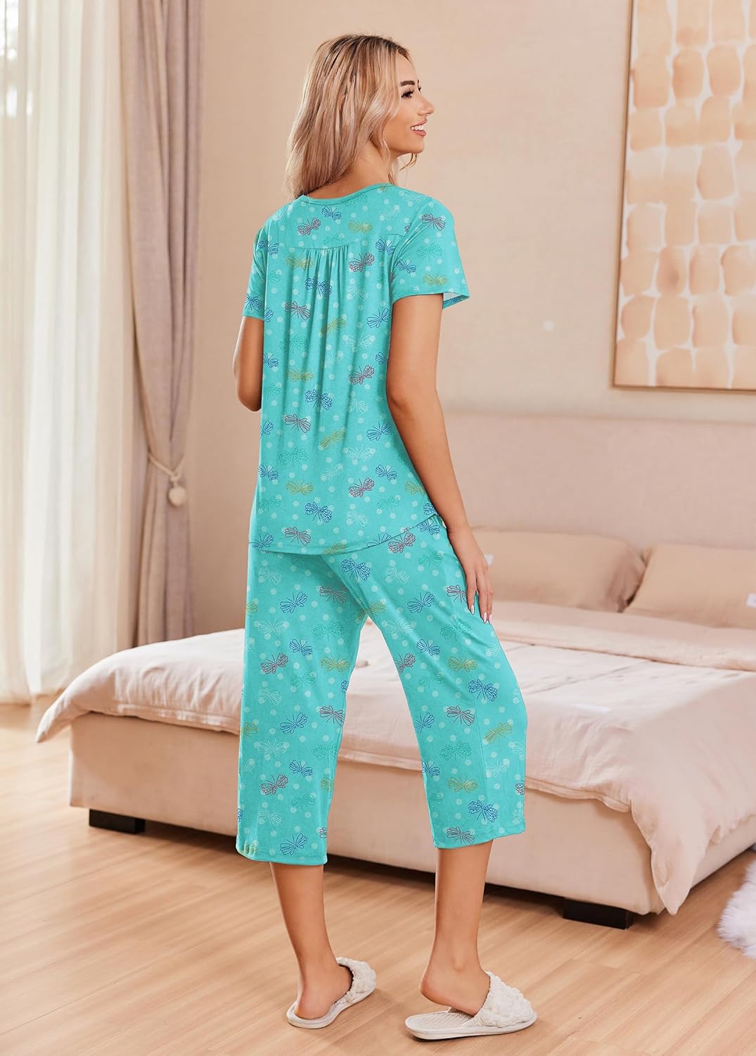 Turquoise patterned button-up pajama set with matching capri pants, short sleeves, back view