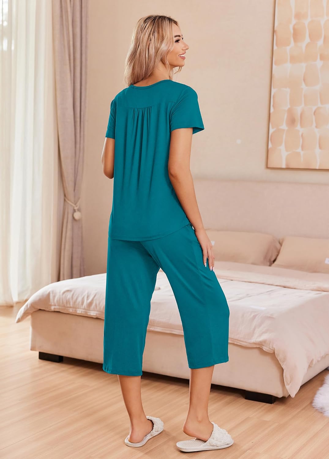 Teal green button-up pajama set with matching capri pants, short sleeves, back view