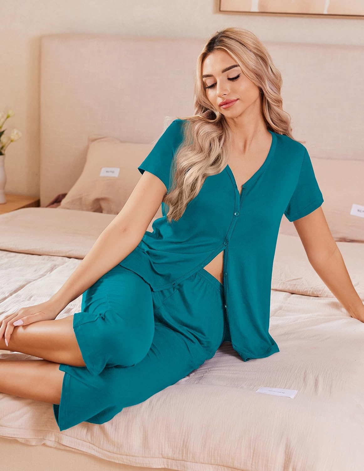 Teal button-up pajama top with matching capri pants, short sleeves and V-neck
