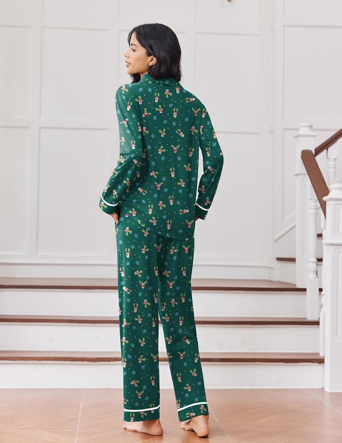 Back view of green reindeer print long-sleeve pajama set with matching pants